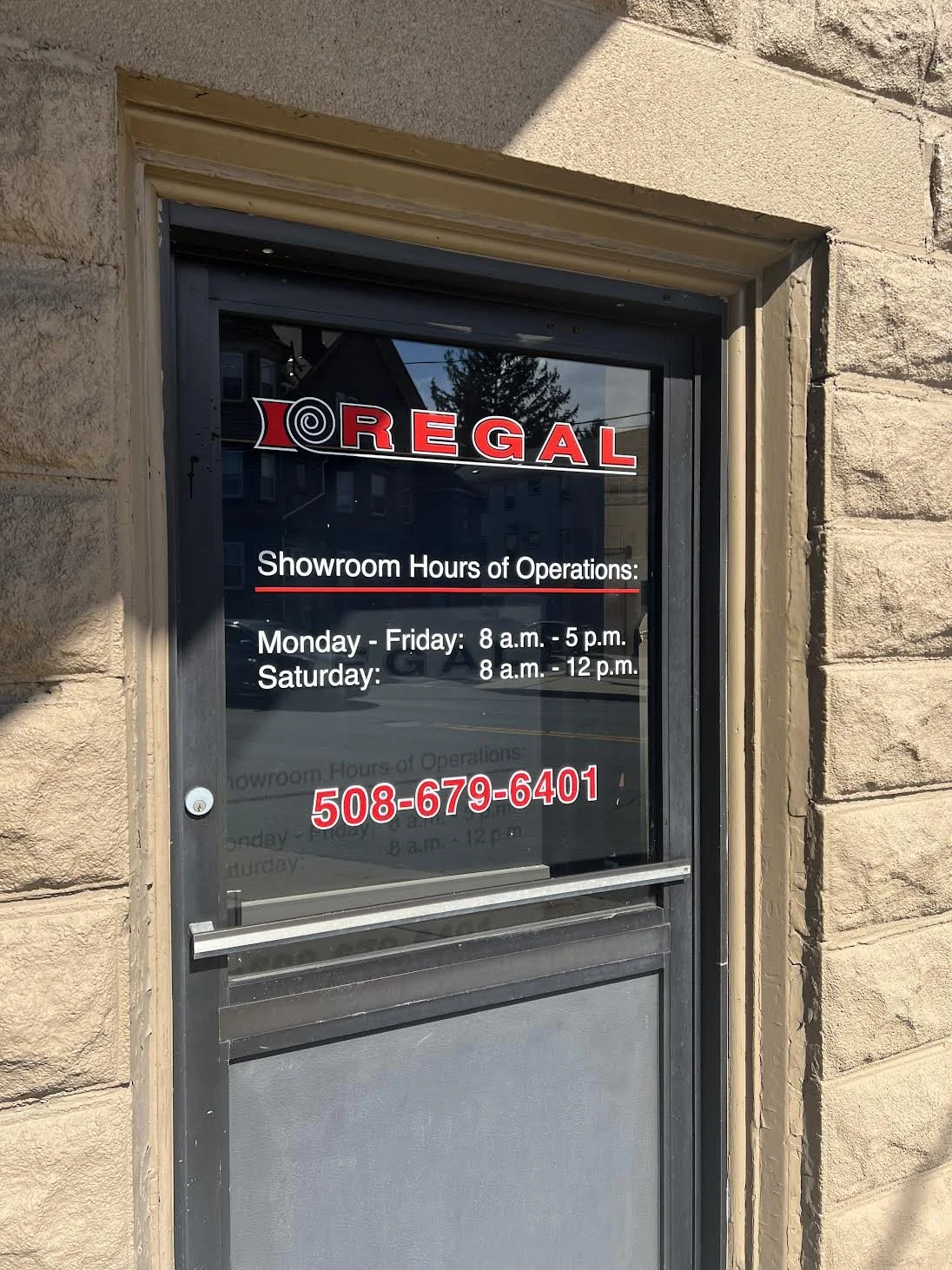 Team at Regal Flooring added some Branding & Hours of Operations of a empty glass unit they were looking to fill!