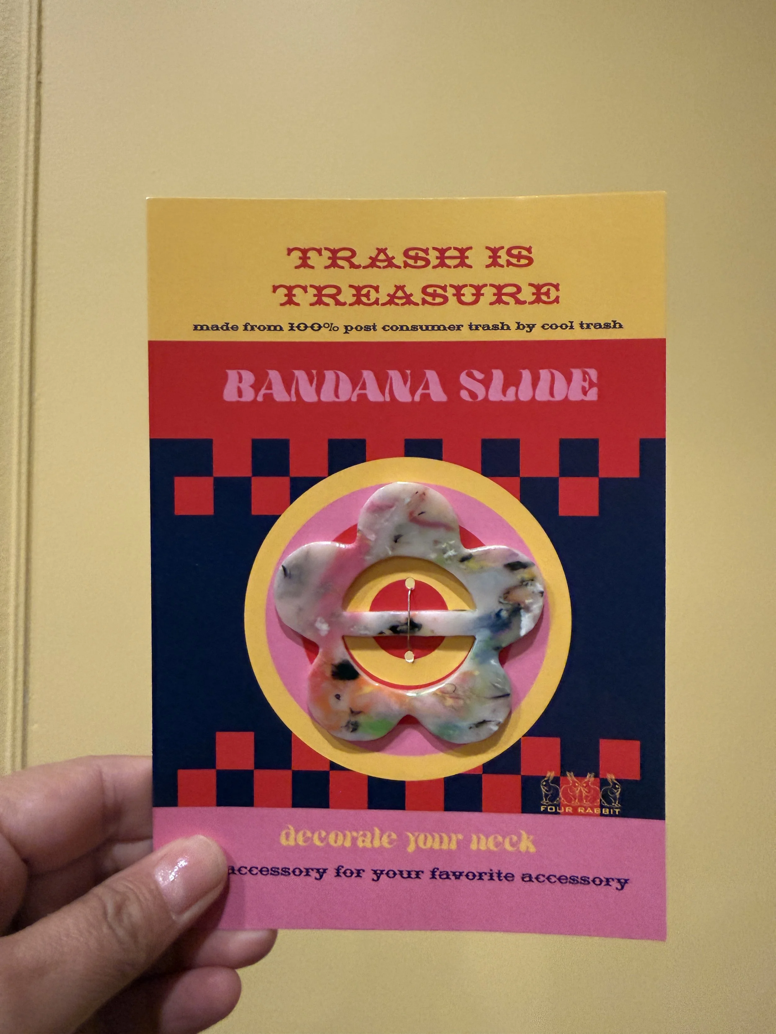 A bandana slide attached to its packaging