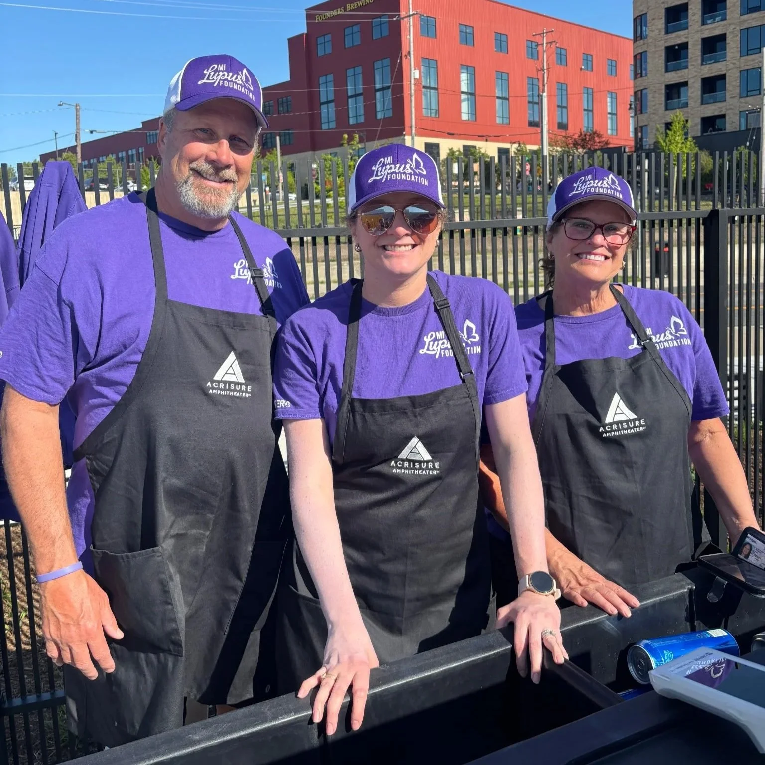 MICHIGAN LUPUS FOUNDATION VOLUNTEERS HELPED OPEN THE NEW ACRISURE AMPHITHEATER IN DOWNTOWN GRAND RAPIDS DURING LUPUS AWARENESS MONTH