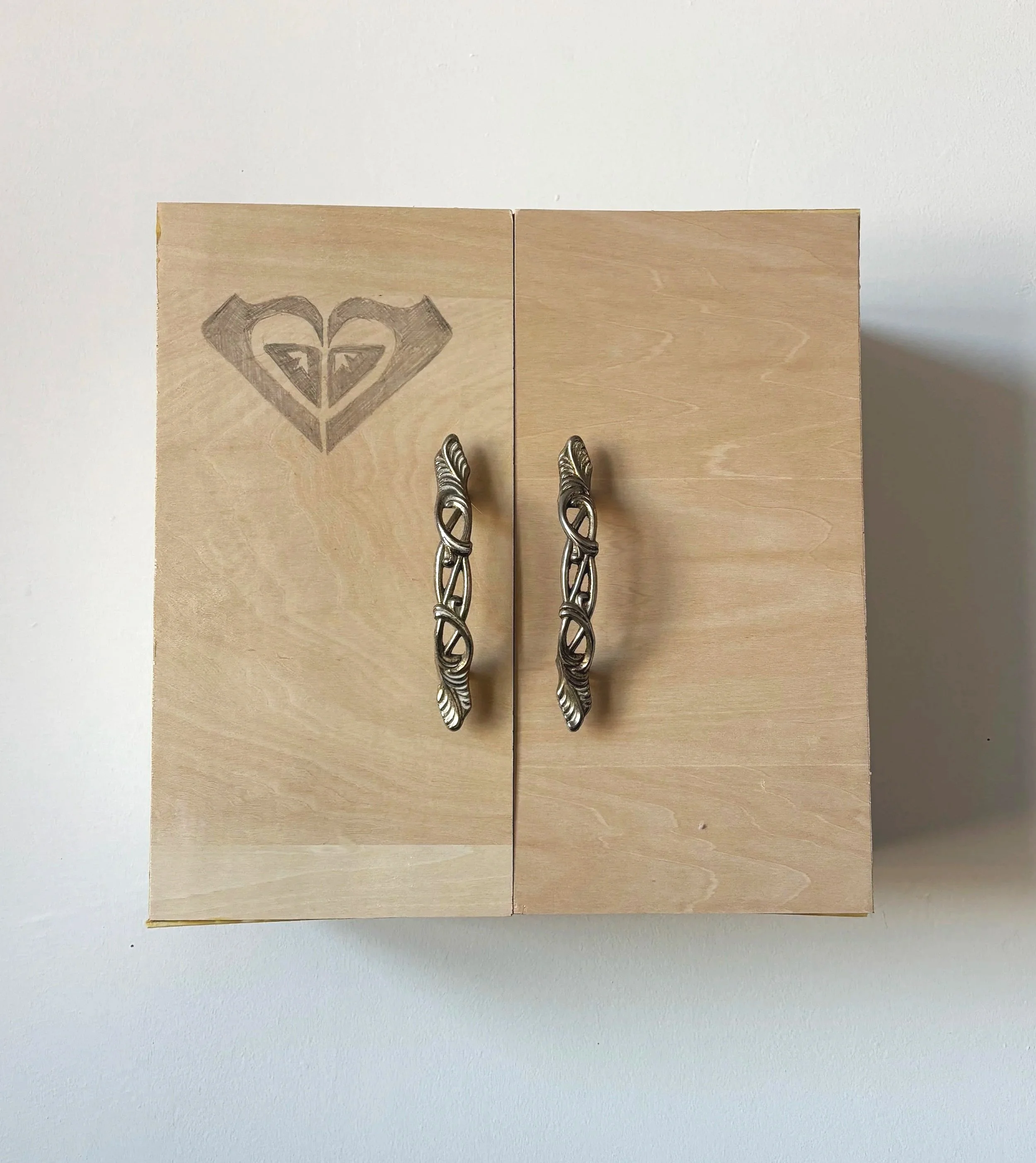 Roxy Box, 2026, Wood, metal handles, graphite, secrets, 12” x 12” x 6”
