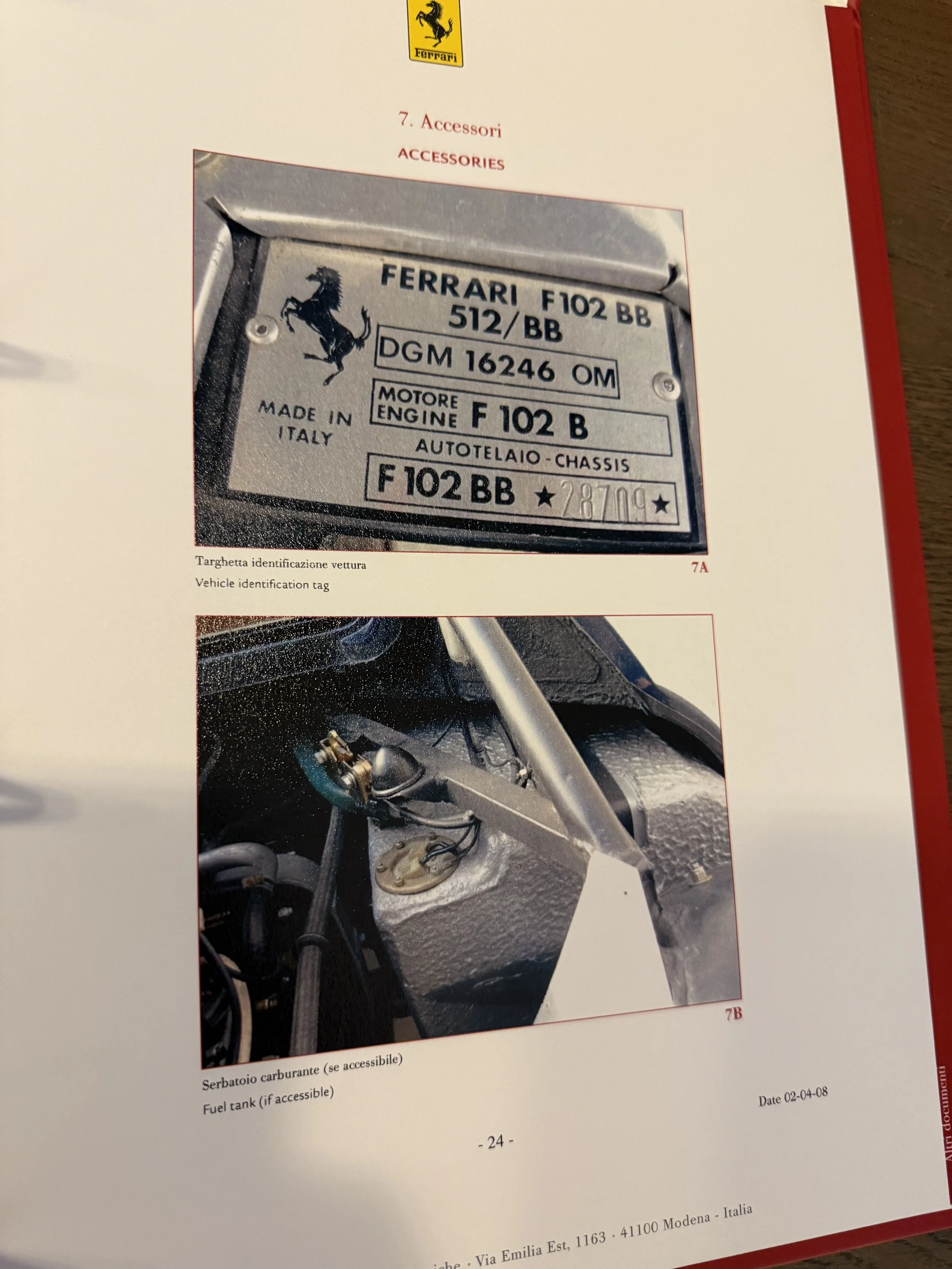 Photograph of an automotive identification tag for a Ferrari F102 BB, showing serial numbers, engine type, and manufacturing details. Below, a close-up of part of the car's interior dashboard or engine bay with visible metal components and wiring.