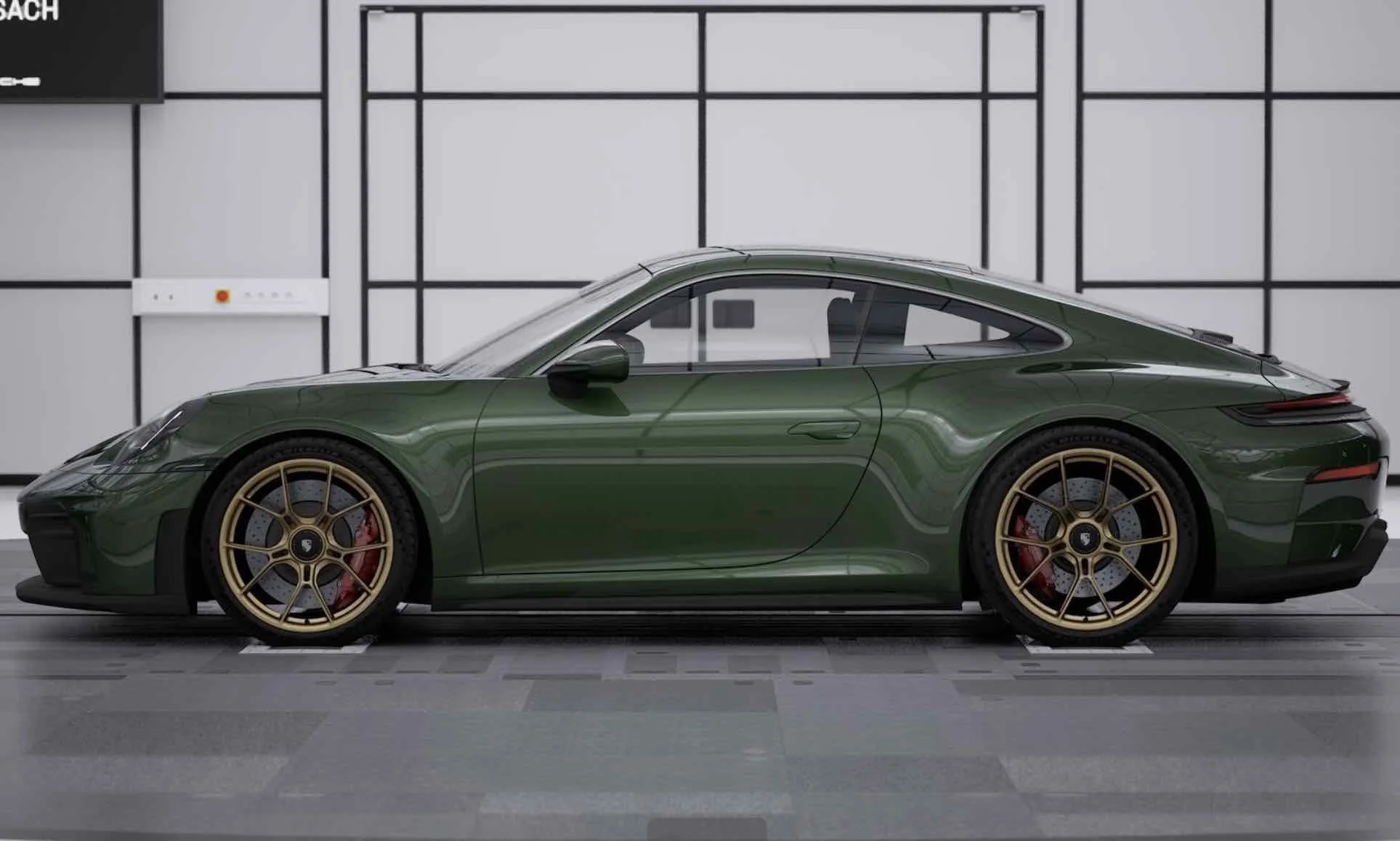 Green sports car inside a modern showroom with black and white walls.