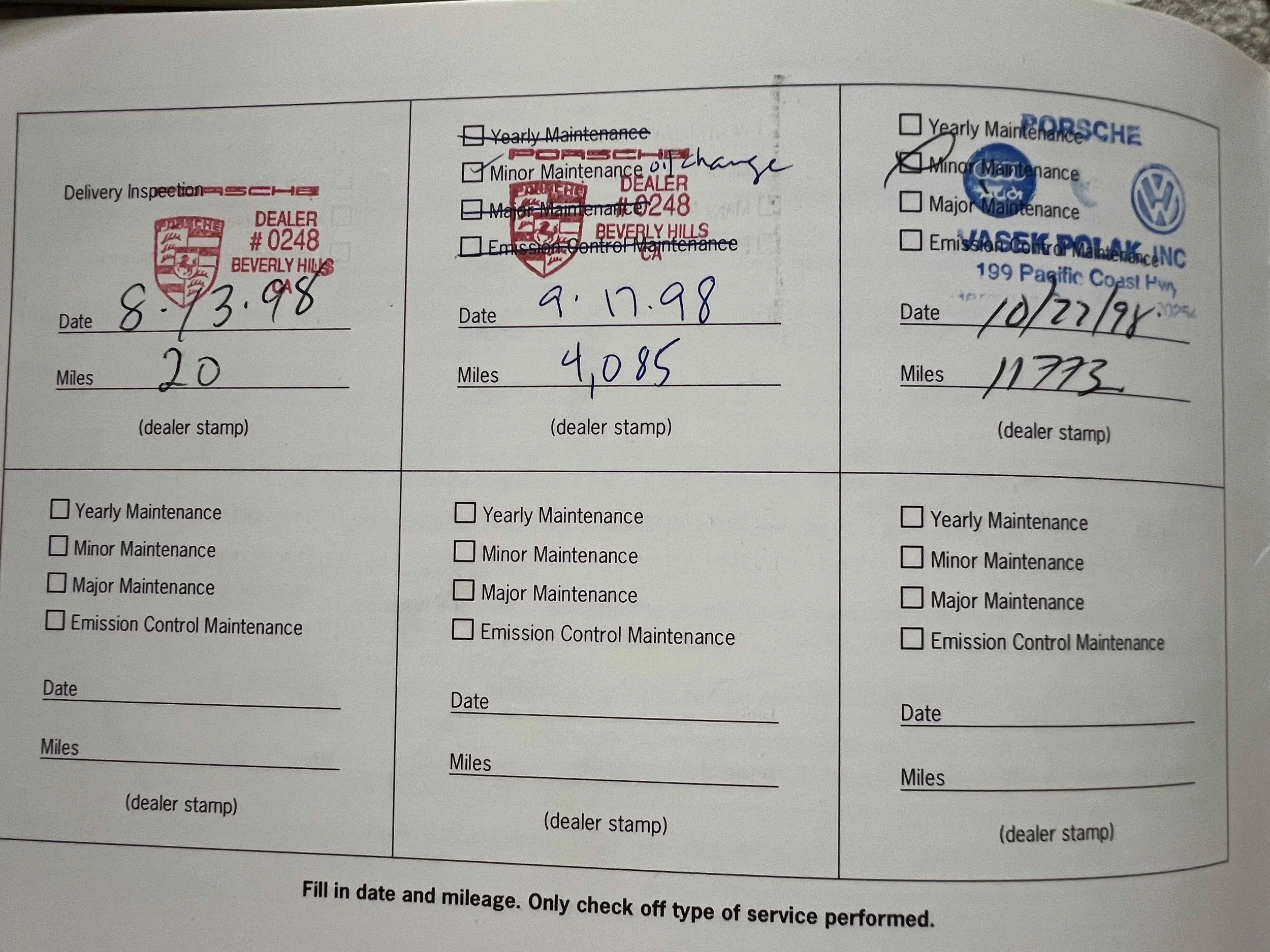 A car maintenance record sheet with dates, mileage, and dealership stamps for three service visits, including Porsche, Beverly Hills, and Volkswagen.