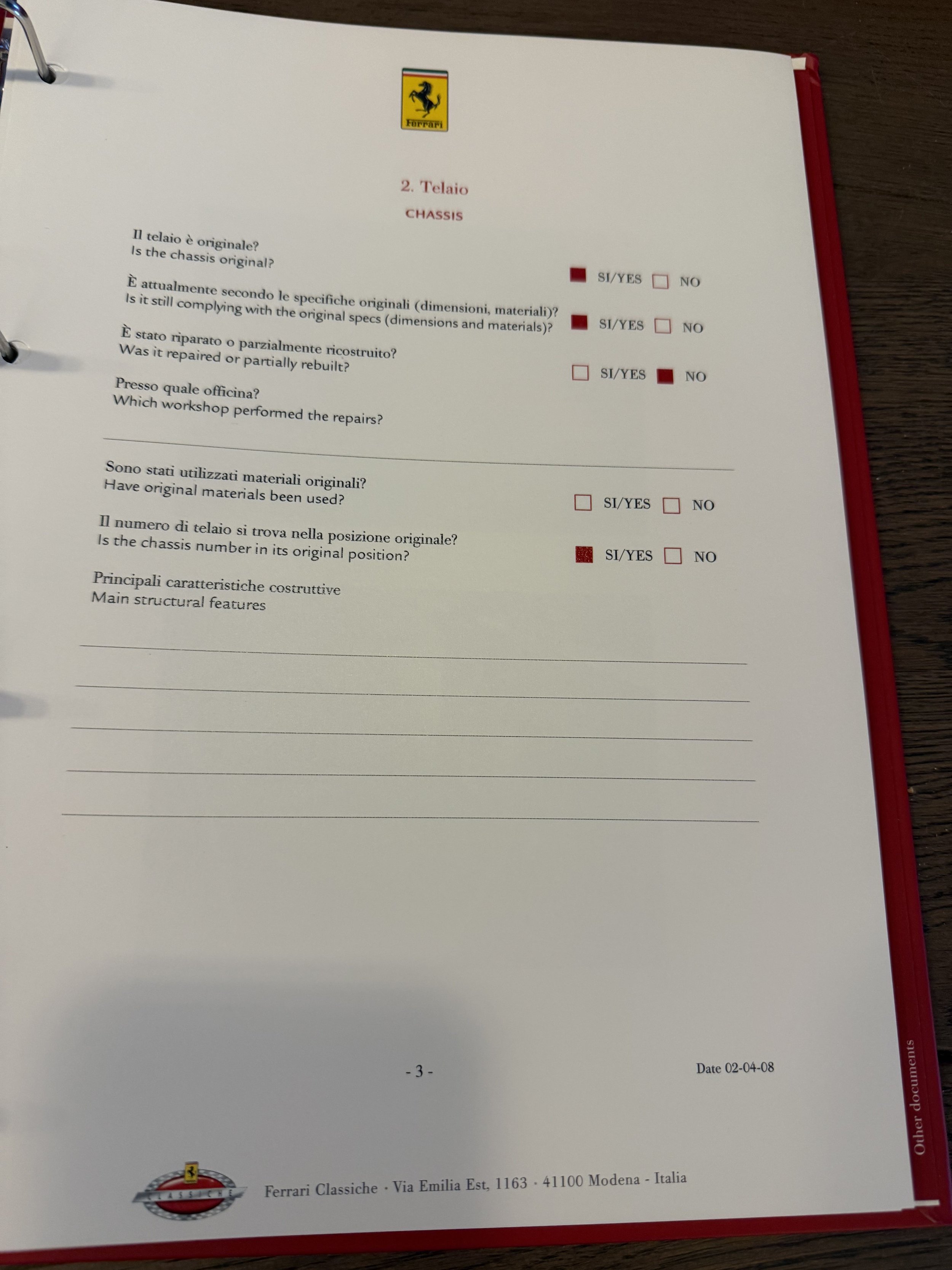 Page of Ferrari Classiche Red Book showing photographs of a 1979 Ferrari 512 BB sports car, including front and rear views, on a plain background, with a Ferrari logo at the top and Italian address at the bottom.