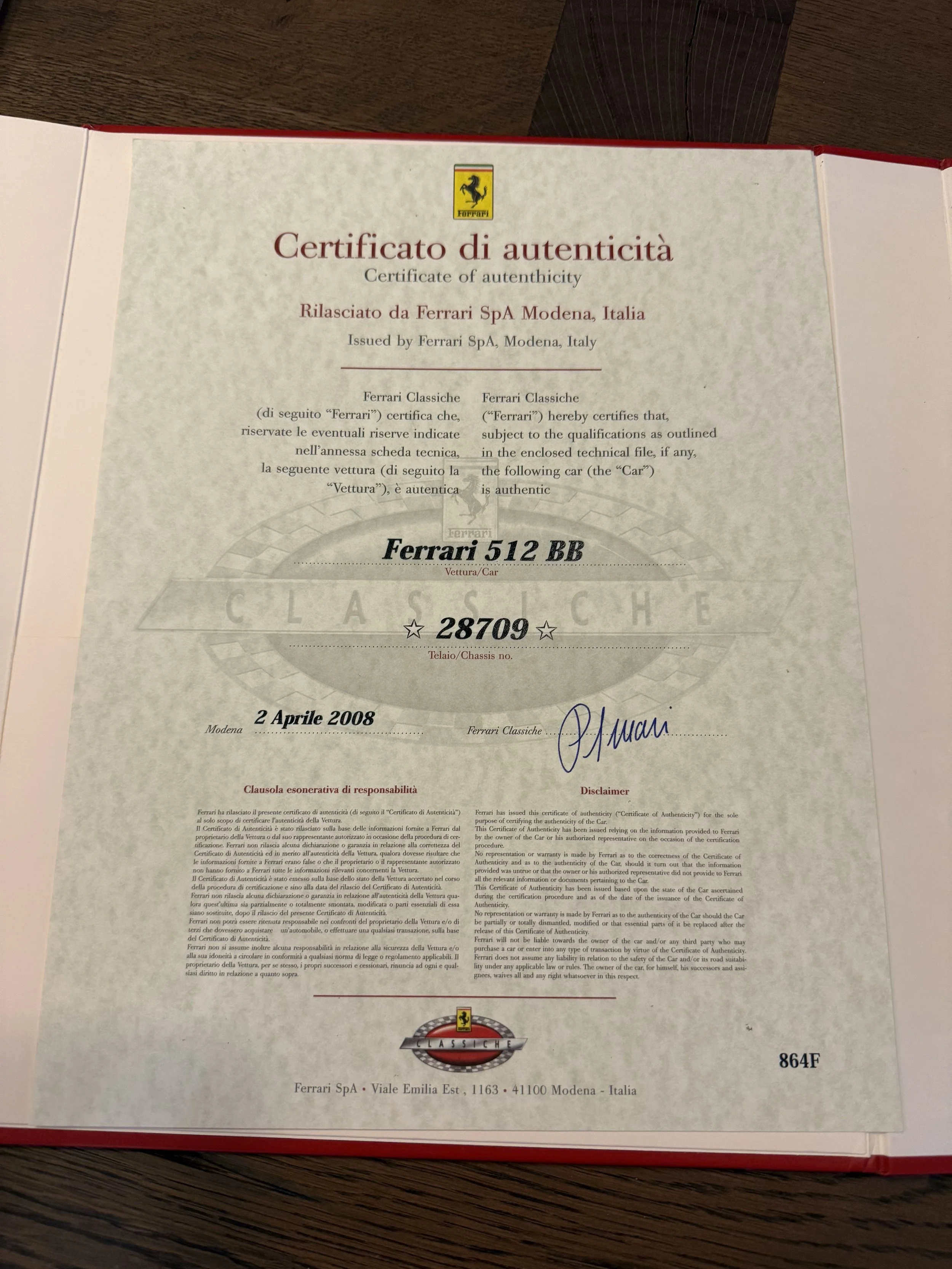 Certificate of authenticity for a Ferrari 512 BB, issued by Ferrari Spa Italy, dated April 2, 2008, with signatures and official stamps.