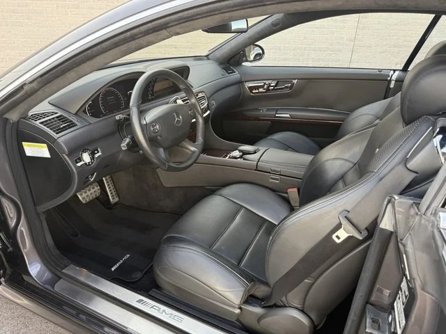 Driver side interior of Grey 2008 Mercedes Benz CL63 AMG for sale at FlowHaus