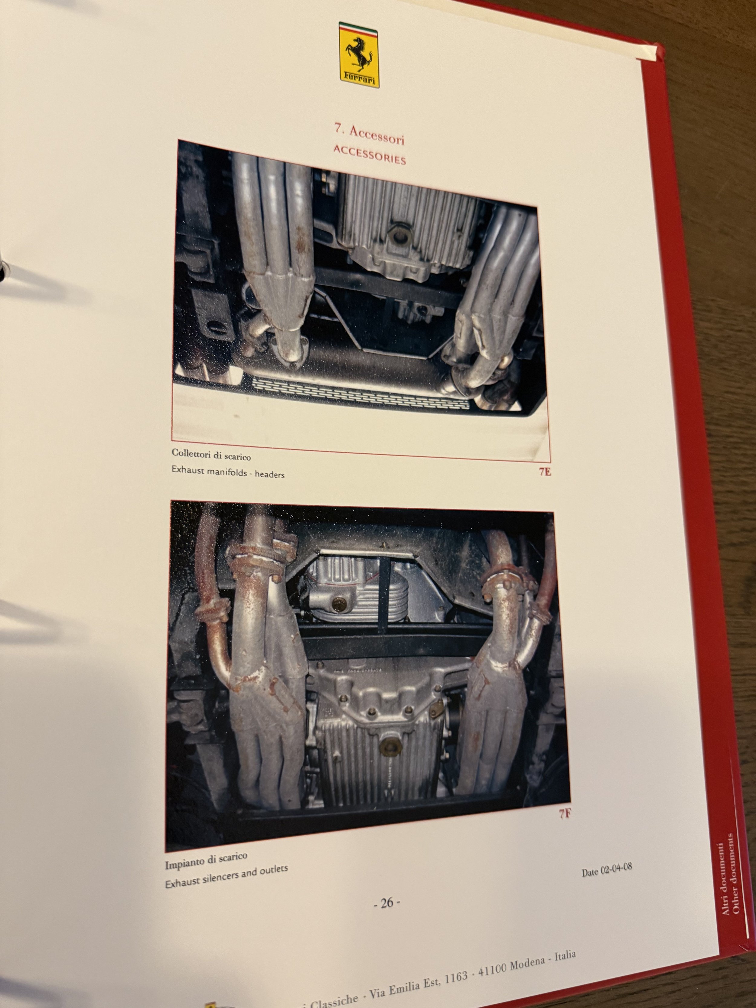 A page from Ferrari Classiche Red Book showing images of exhaust manifolds and silencers and outlets underneath a car.