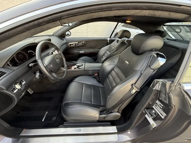 Driver side interior of Grey 2008 Mercedes Benz CL63 AMG for sale at FlowHaus