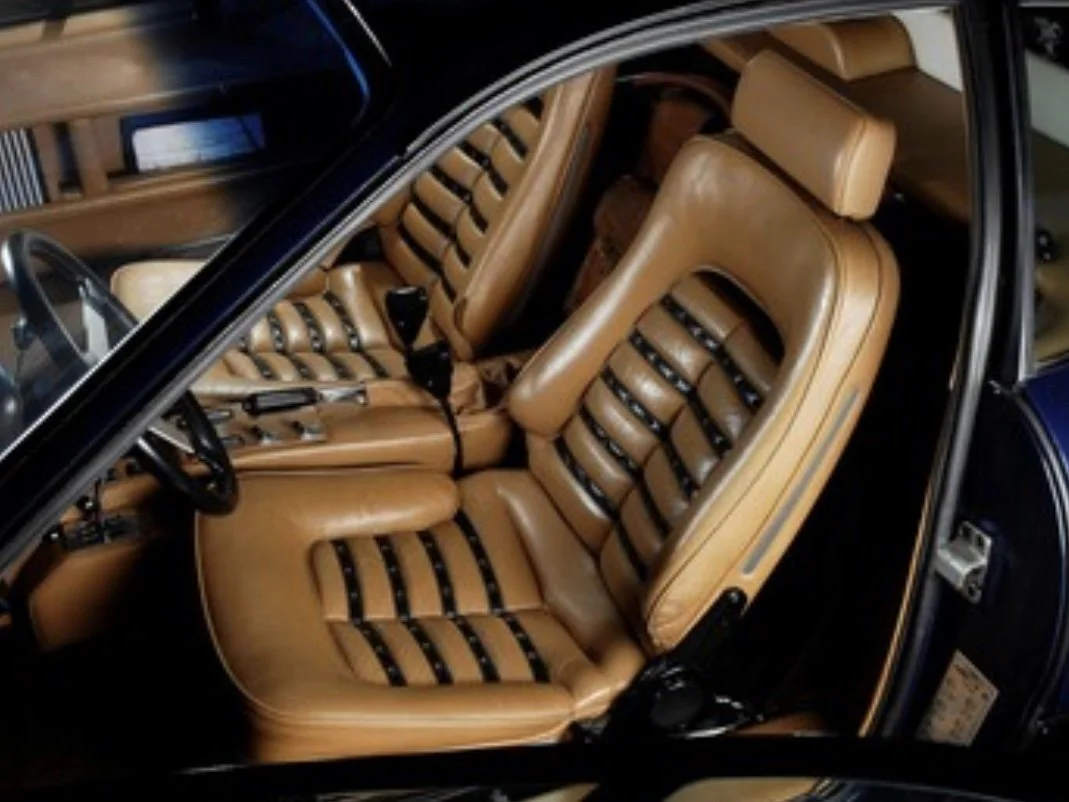 Tan and black seats on Blue 1979 Ferrari 512 BB 