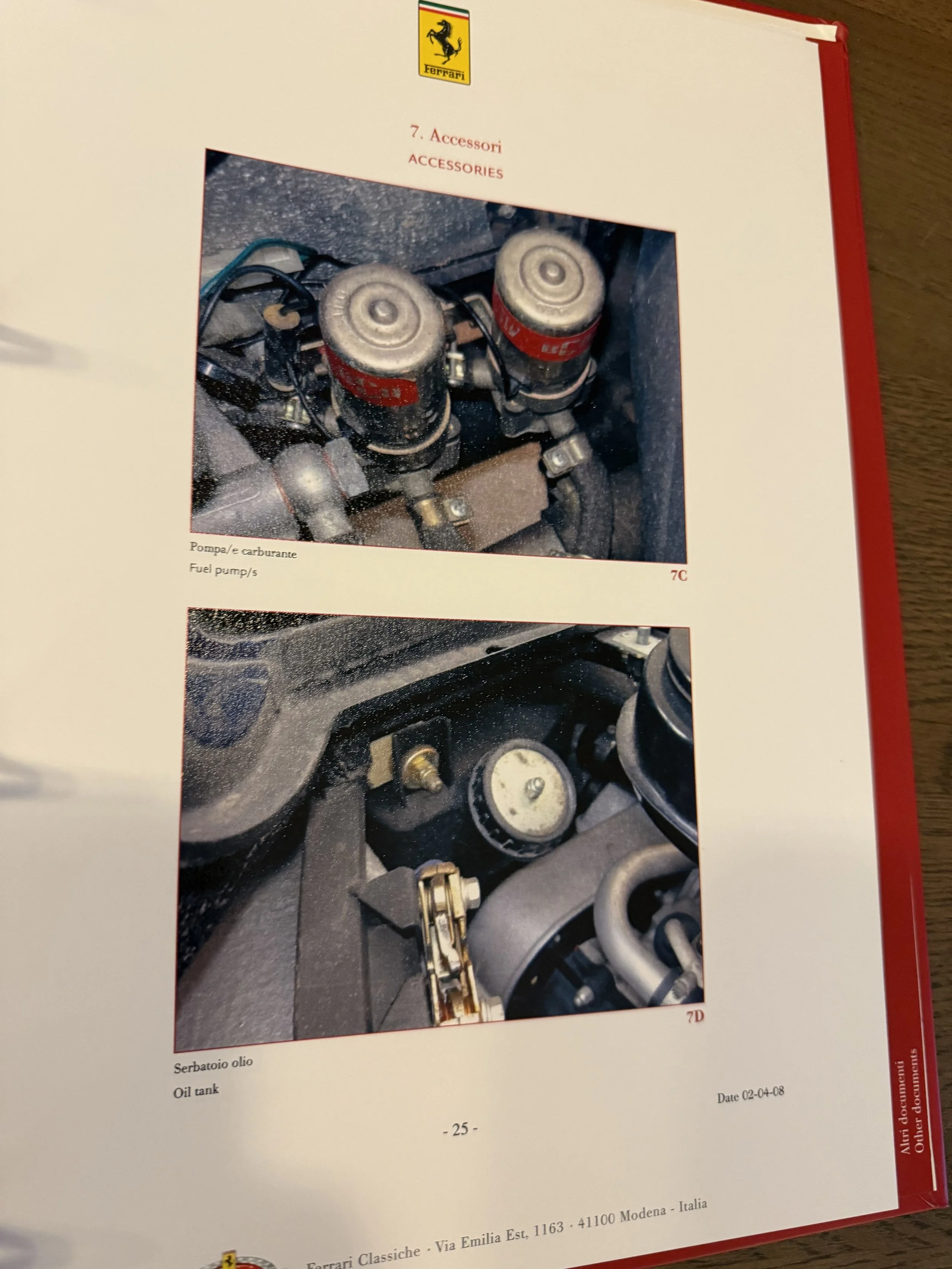 Page from a Ferrari Classiche Red Book showing two photographs of car engine components. The top photo depicts fuel pumps labeled 'Pompa e carburante', and the bottom photo shows an oil tank labeled 'Serbatoio olio.'