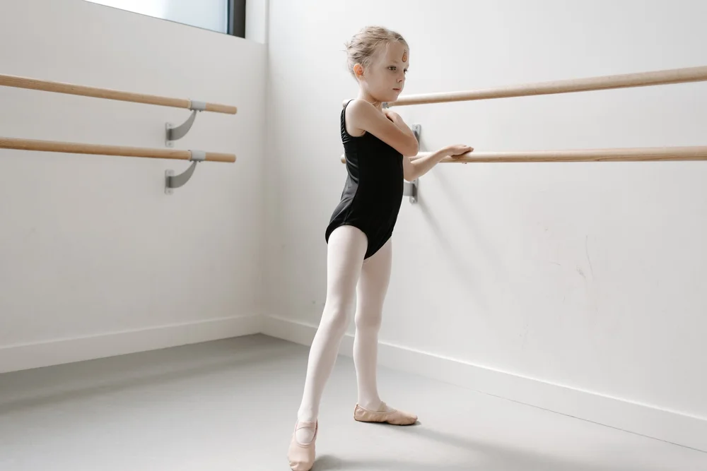 A dancer in class at Neighborhood Ballet