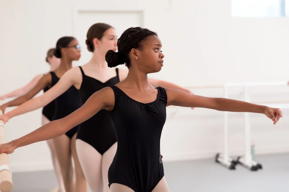 Teen dancers practicing ballet at Neighborhood Ballet