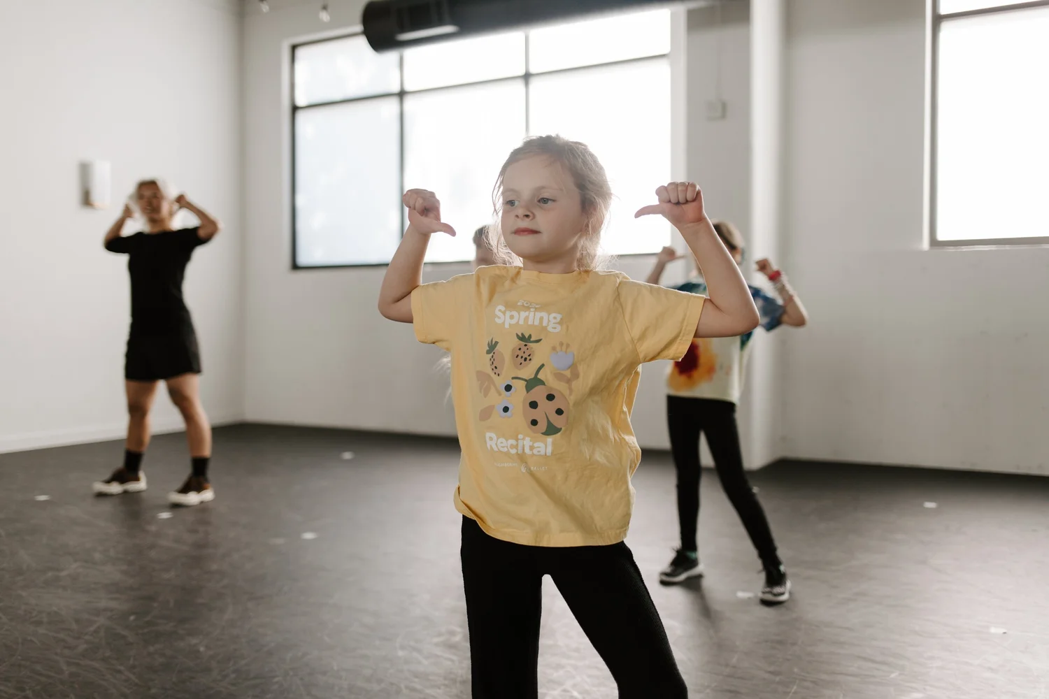 Dancers in class at Neighborhood Ballet