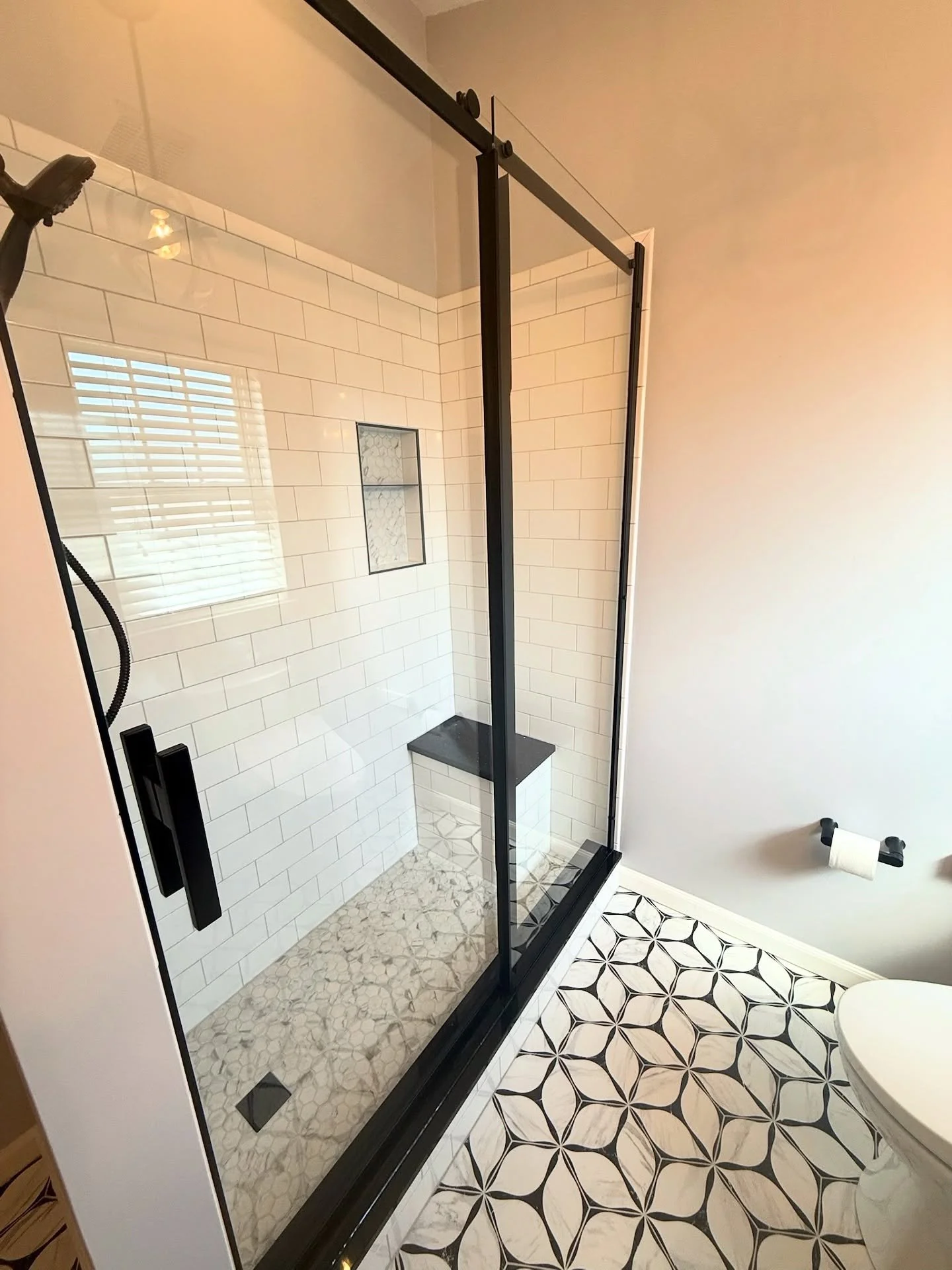 This customer had a bad experience with a leaking shower, so Greenline came in and replaced everything including new subfloor, a completely new shower using Schluter waterproofing systems, new tile floor, and an upgraded bidet toilet seat system whic