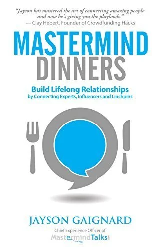 Book cover titled "Mastermind Dinners" by Jayson Gaignard, featuring an illustration of a blue speech bubble inside a gray plate with a fork on the left and a knife on the right. The cover includes a quote about connection and mastery, and mentions building lifelong relationships.