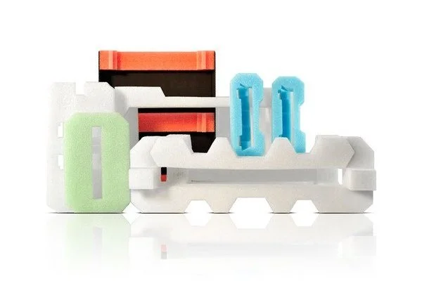 Assorted foam packaging components and protective foam inserts.