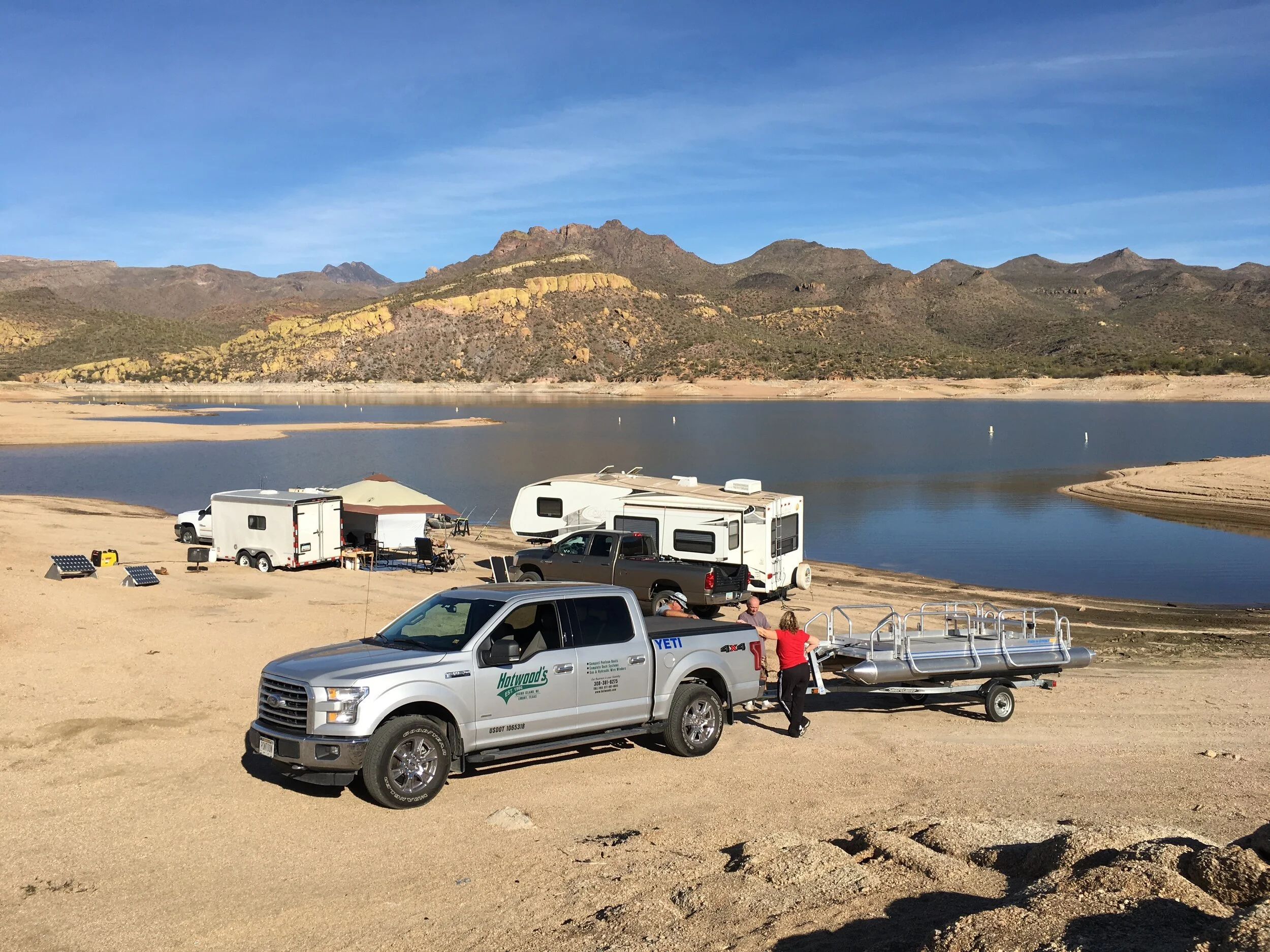 The day we got pulled over in Cave Creek Arizona and sold the boat we were pulling on the spot at a gas station. Delivered to this mans camp spot at the lake near by.