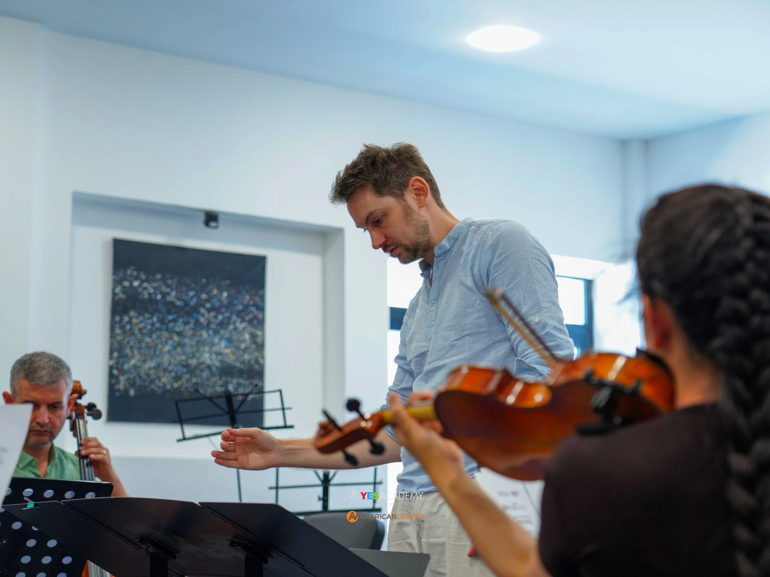 Etienne Haan Conducts Symphony Orch.jpg