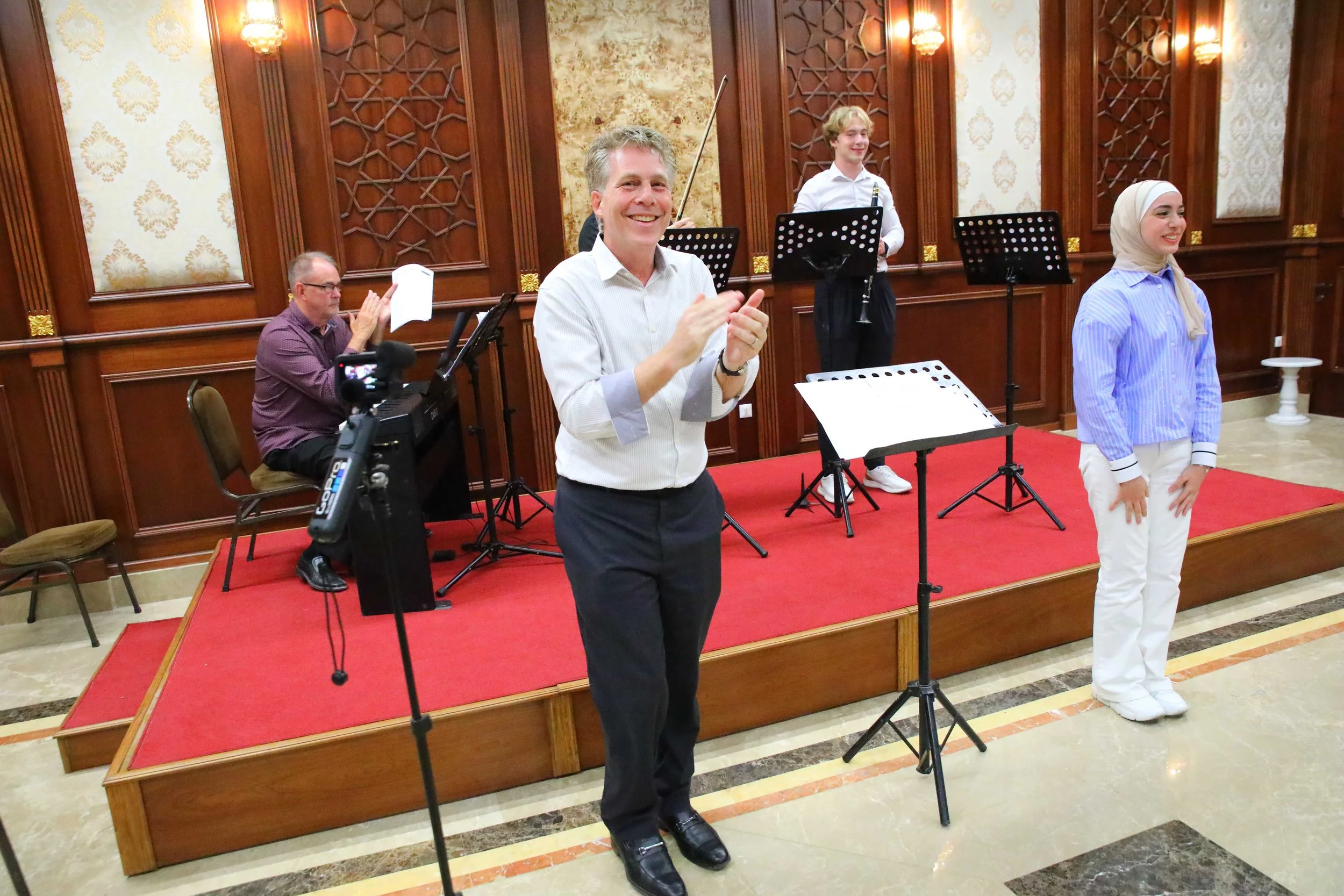 Faculty Ensemble Congratulates Young Composer.jpg