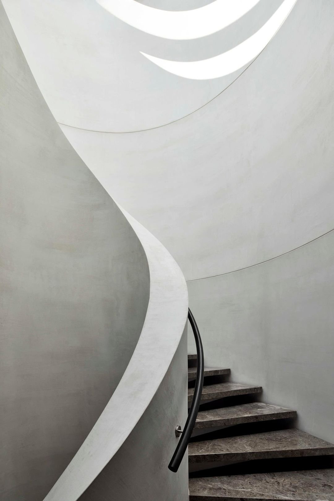 microcement curved wall staircase