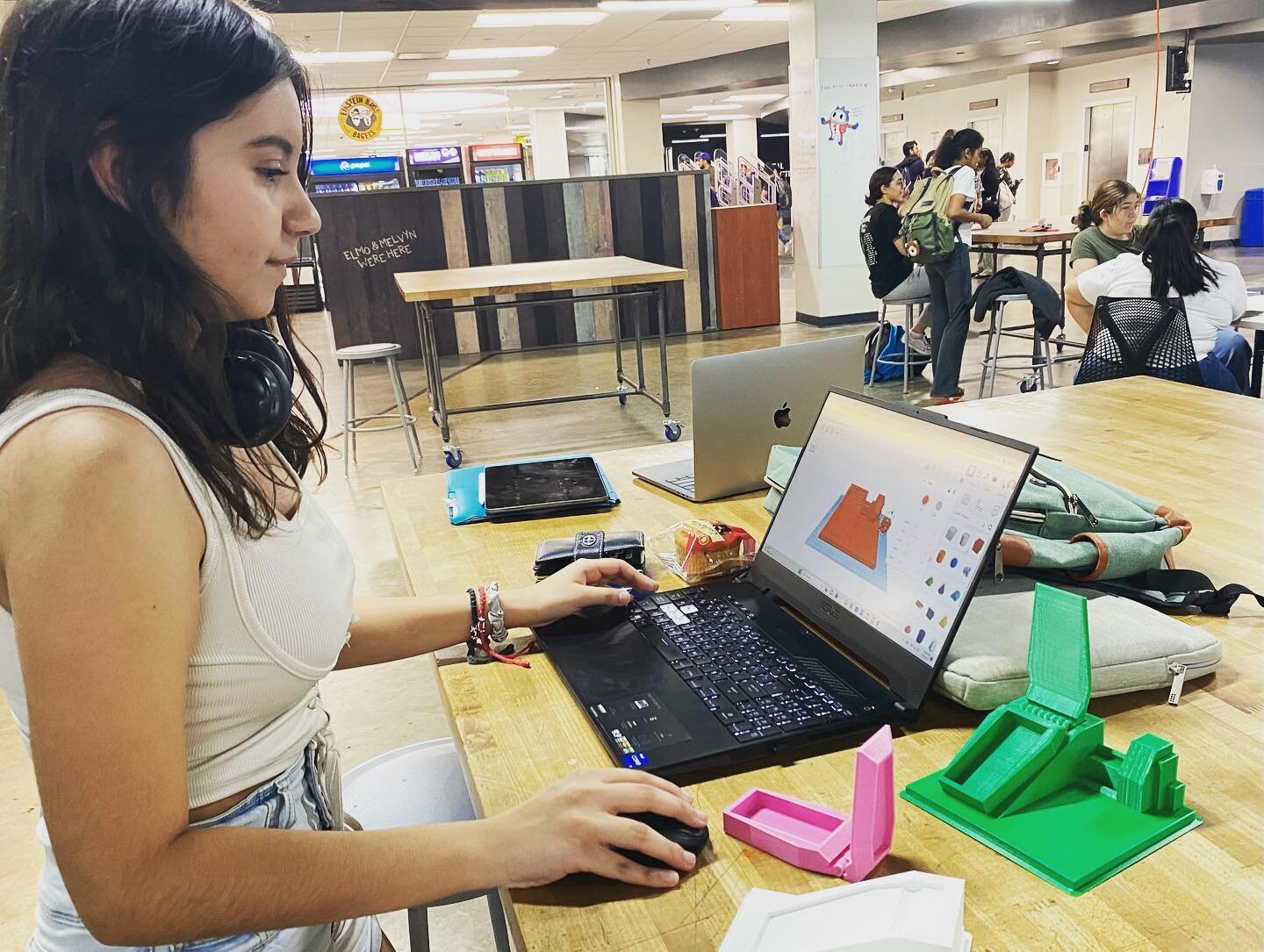 Interactive Media major Iliana Martinez working on her prototypes of Nozick&rsquo;s experience machine.