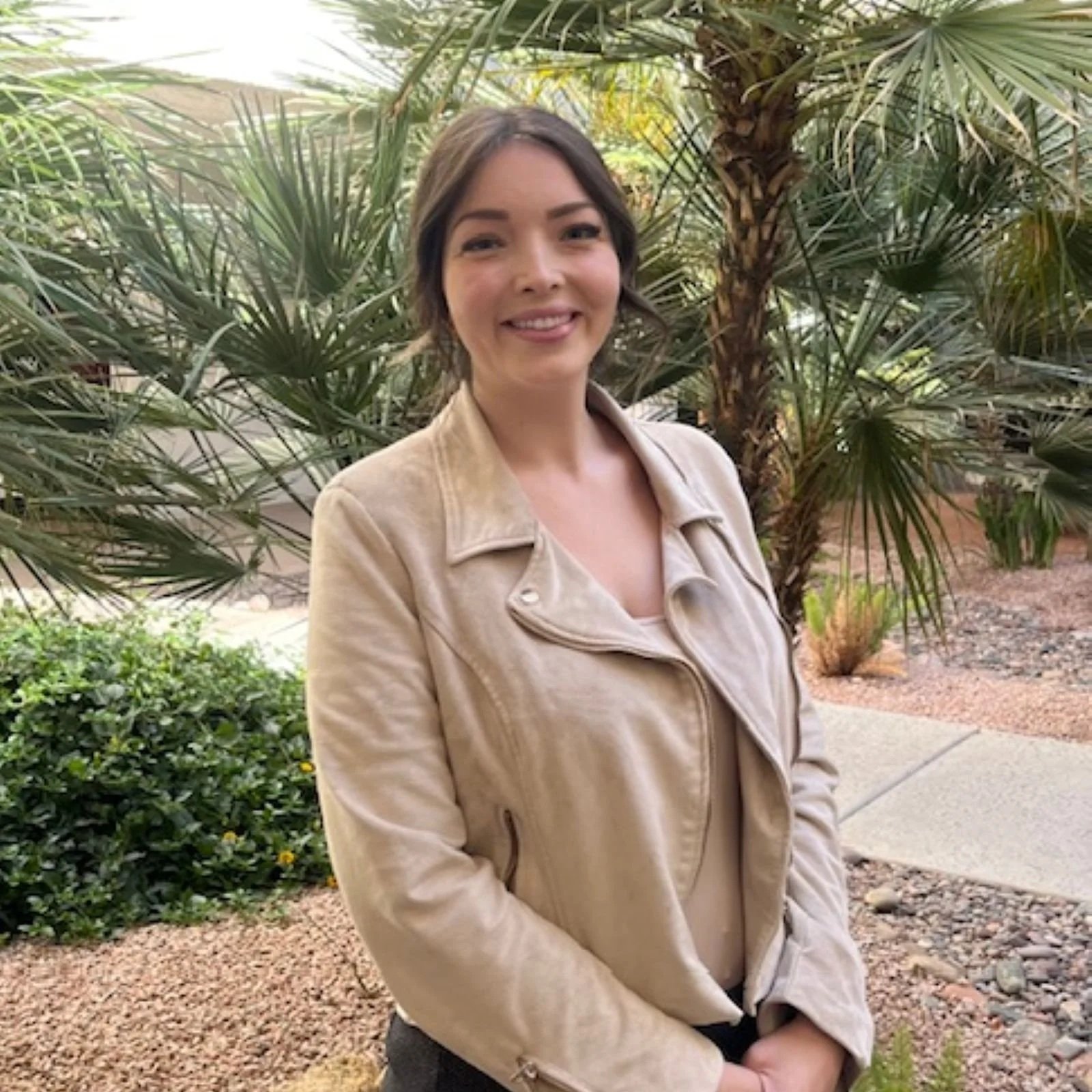 A young professional counselor near me in Tempe, woman with long, dark hair 