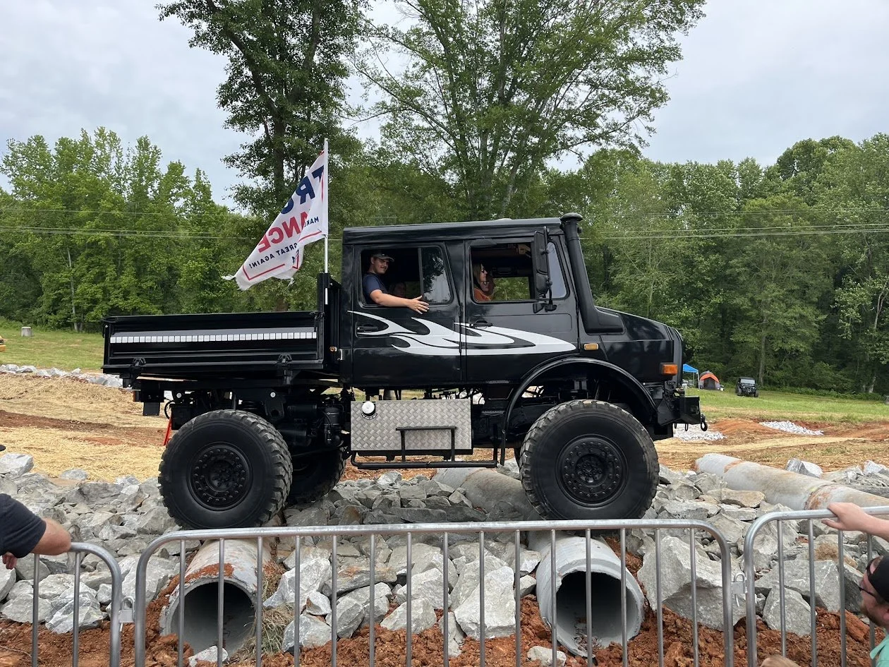 Off-road vehicle tackling the F.A.R.M. Center course