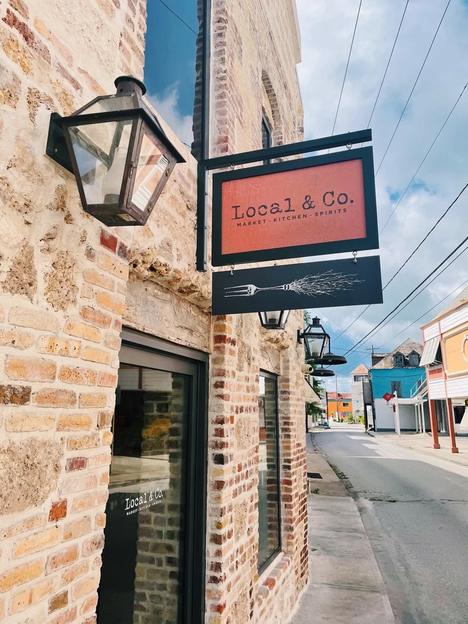 Local & Co. restaurant exterior sign on Queen Street Speightstown Barbados