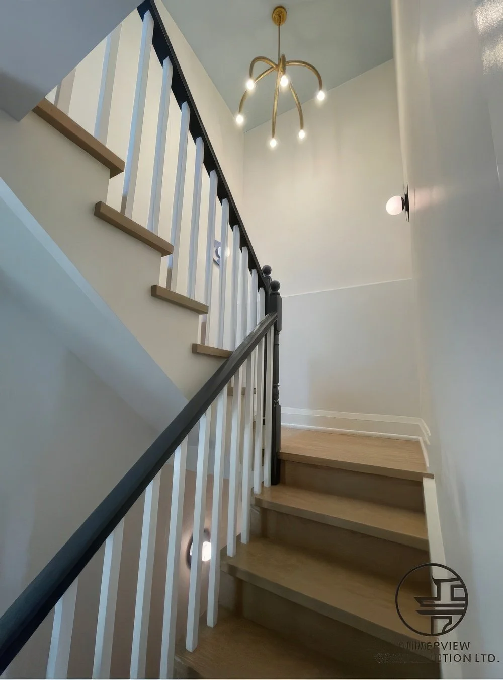 modern-staircase-renovation-wood-steps-white-railing-custom-home-interior-toronto.jpg.jpg
