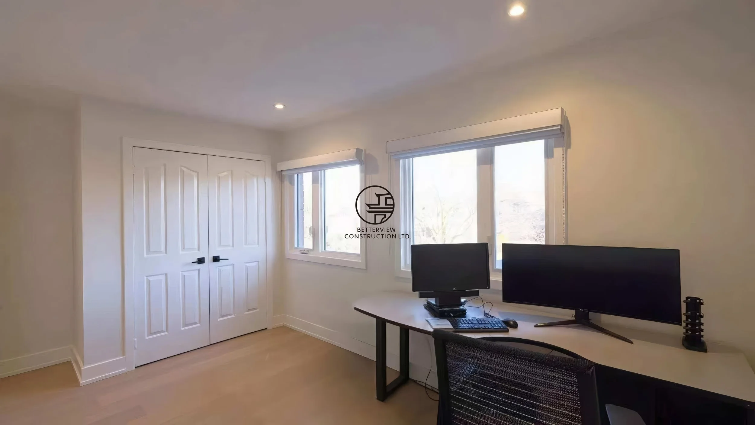 home-office-renovation-dual-monitor-workspace-large-windows-modern-home-toronto.jpg.jpg