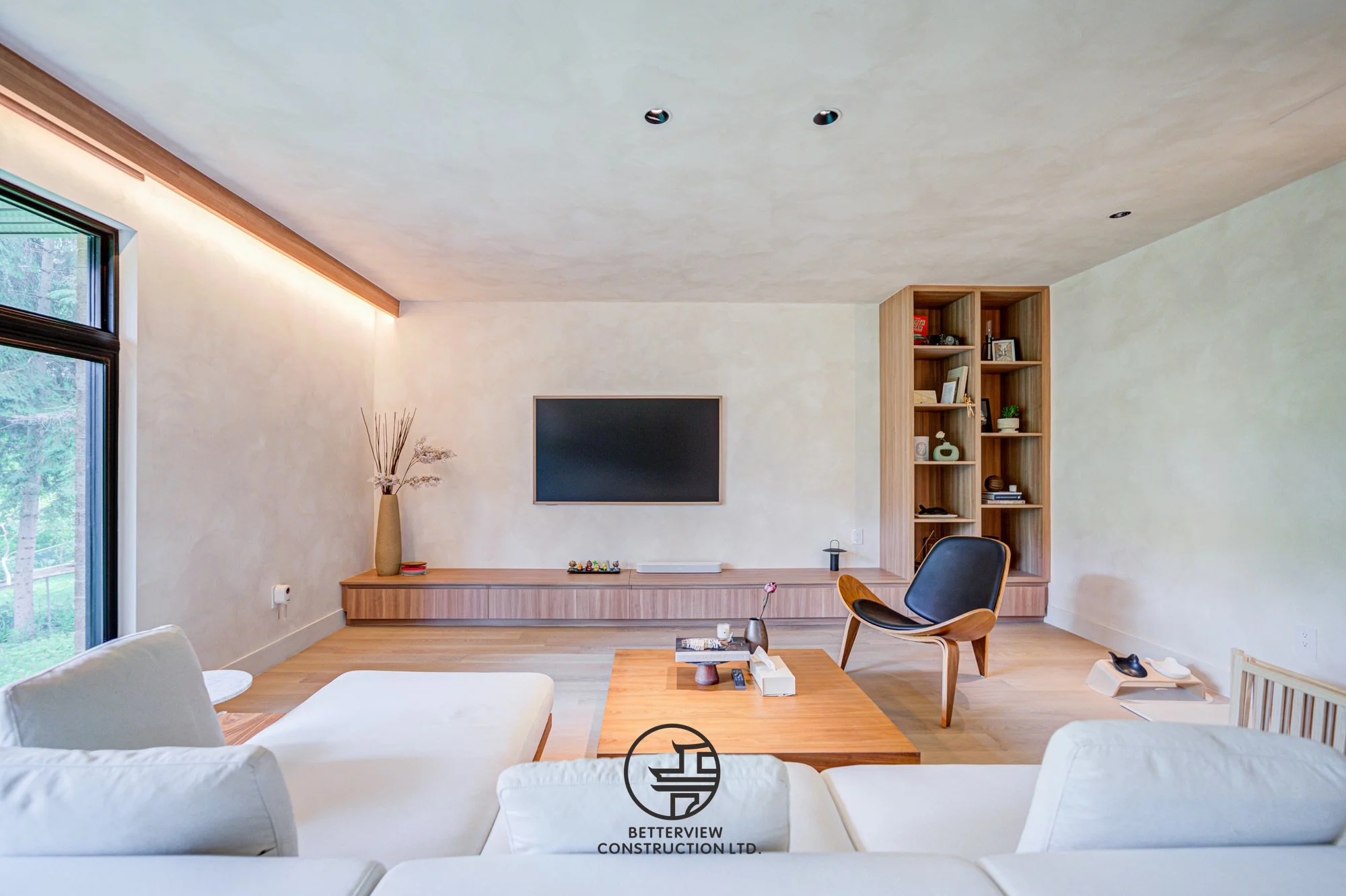 modern living room renovation with large windows and open concept design