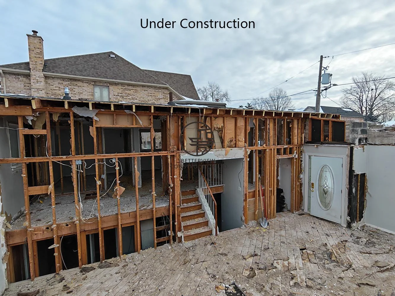 Home demolition in progress before a custom home addition, highlighting structural removal and site preparation for residential construction in the GTA.