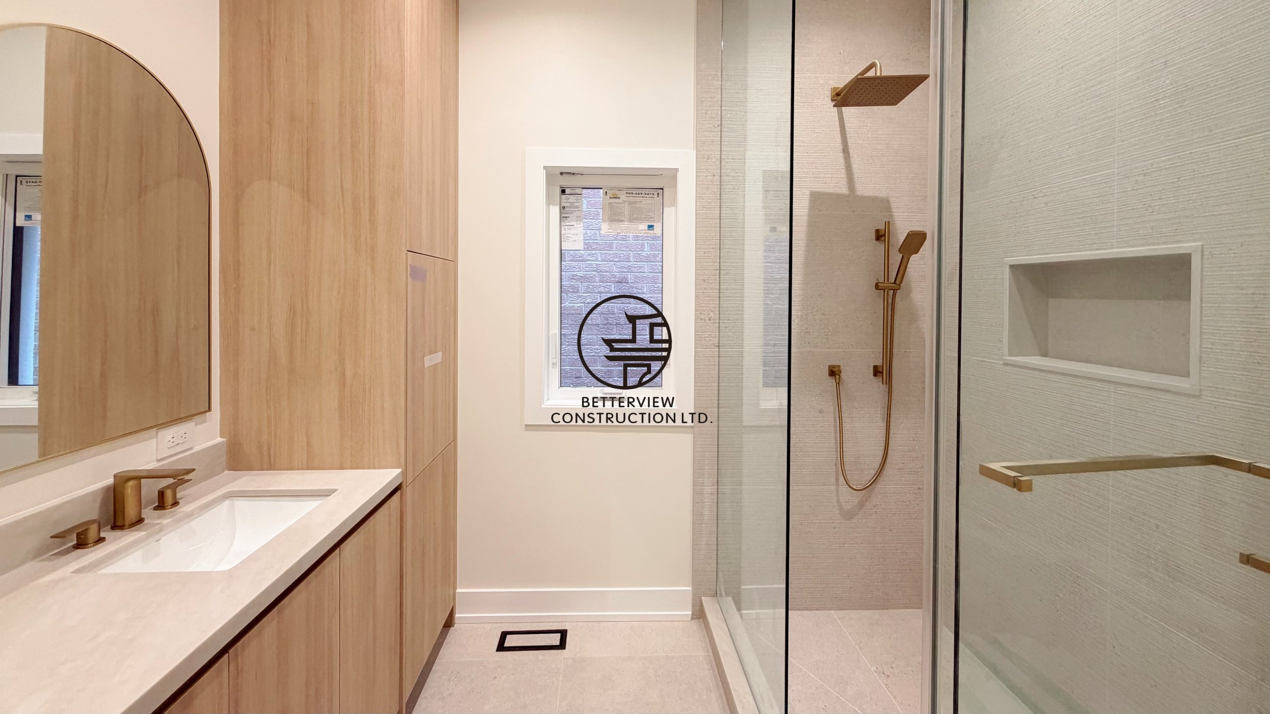 modern-bathroom-renovation-glass-shower-wood-vanity-toronto.jpg