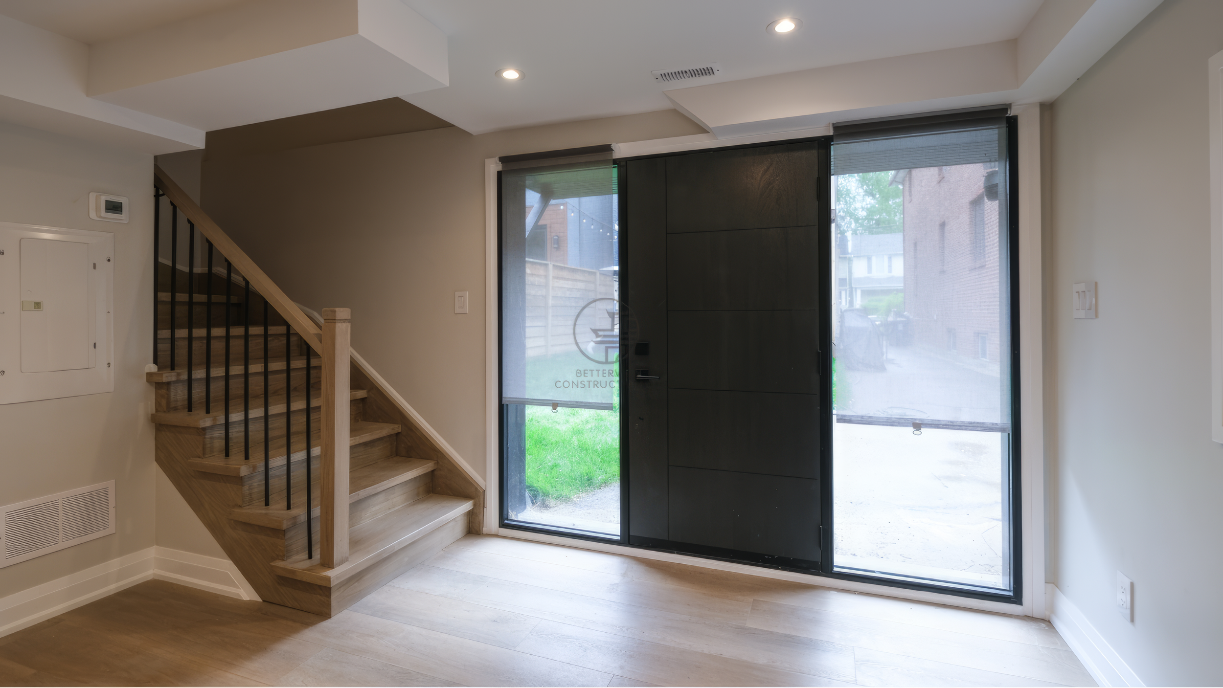 main-floor-entryway-staircase-private-entrance-black-door.jpg.png