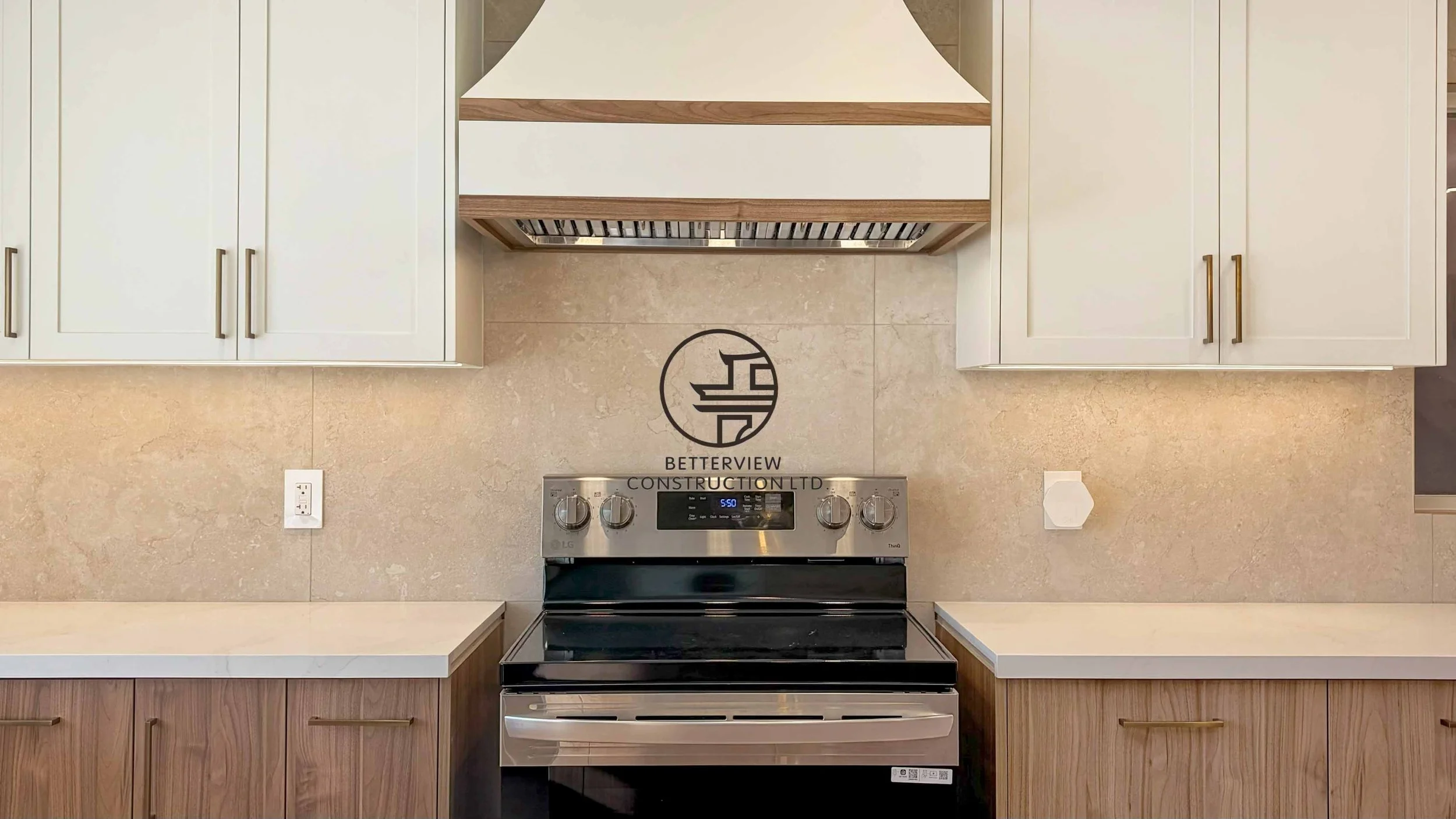 Modern kitchen renovation designed and built by Betterview Construction Ltd., featuring custom millwork cabinetry in warm natural wood tones, premium finishes, and a clean contemporary kitchen design, showcasing high-quality residential construction 