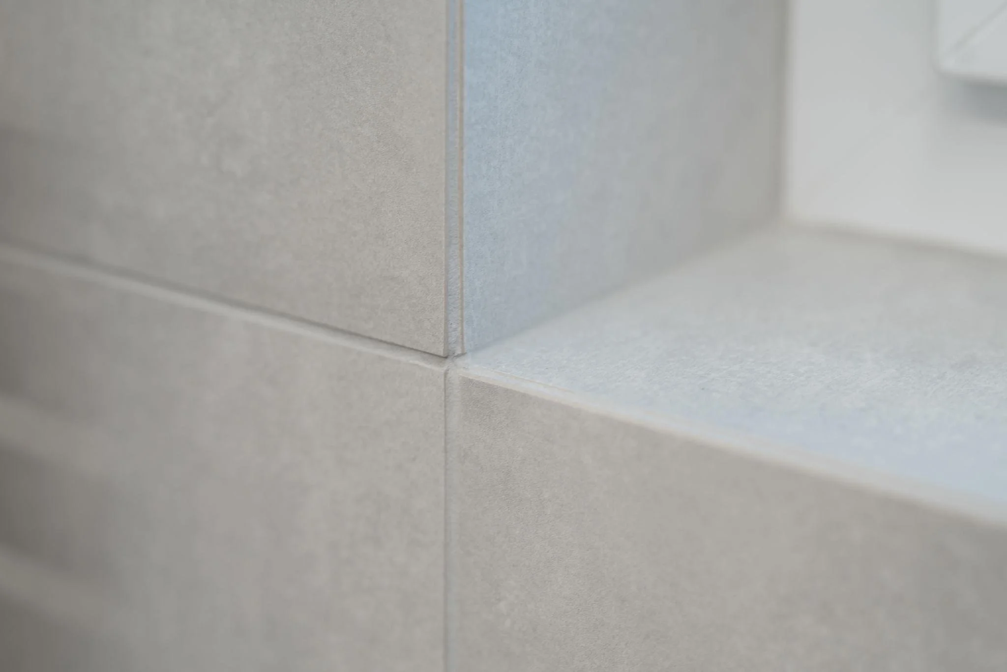 tile-installation-detail-corner-precision-finishing-bathroom.jpg.jpg