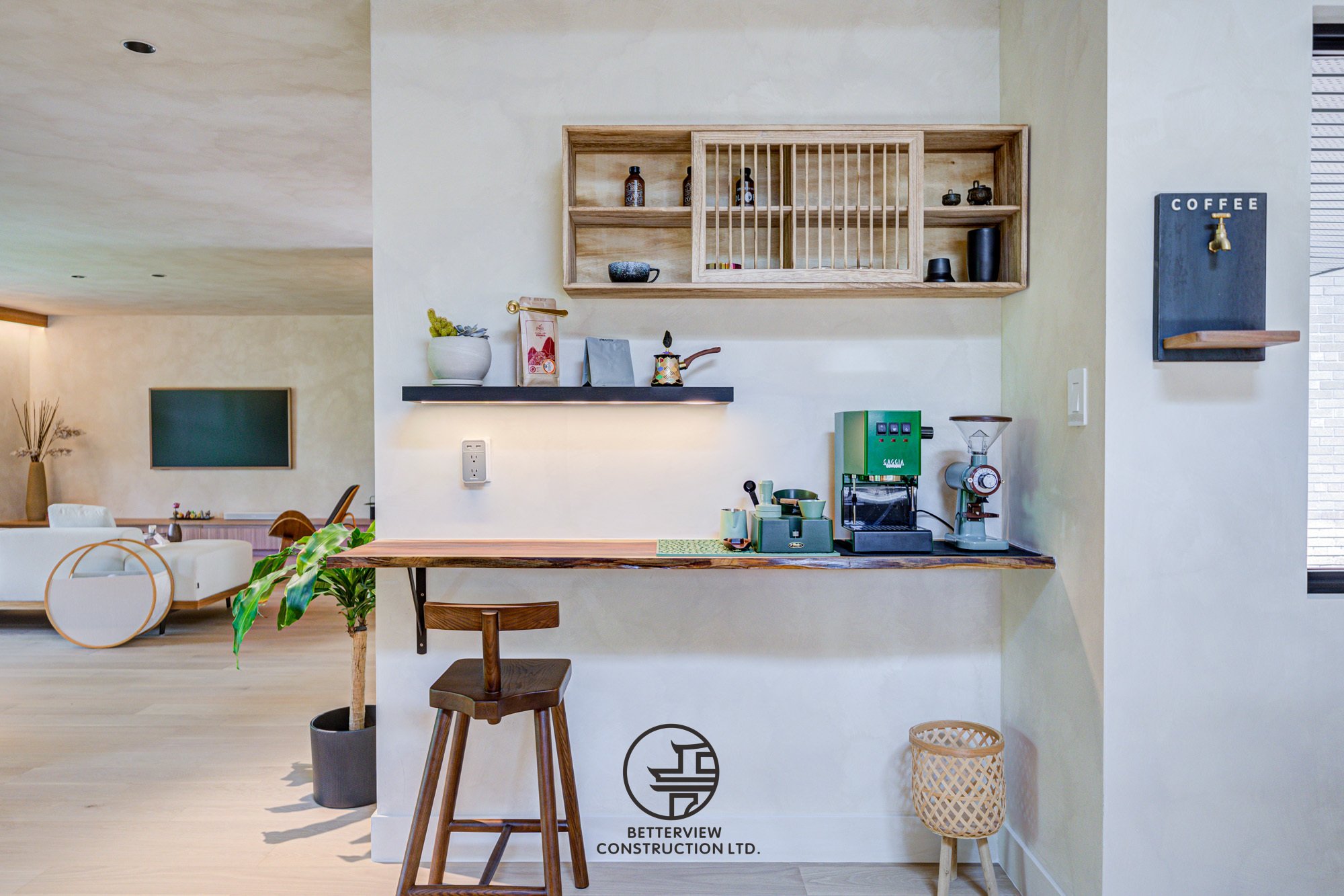 modern home coffee station with wood shelves and espresso machine