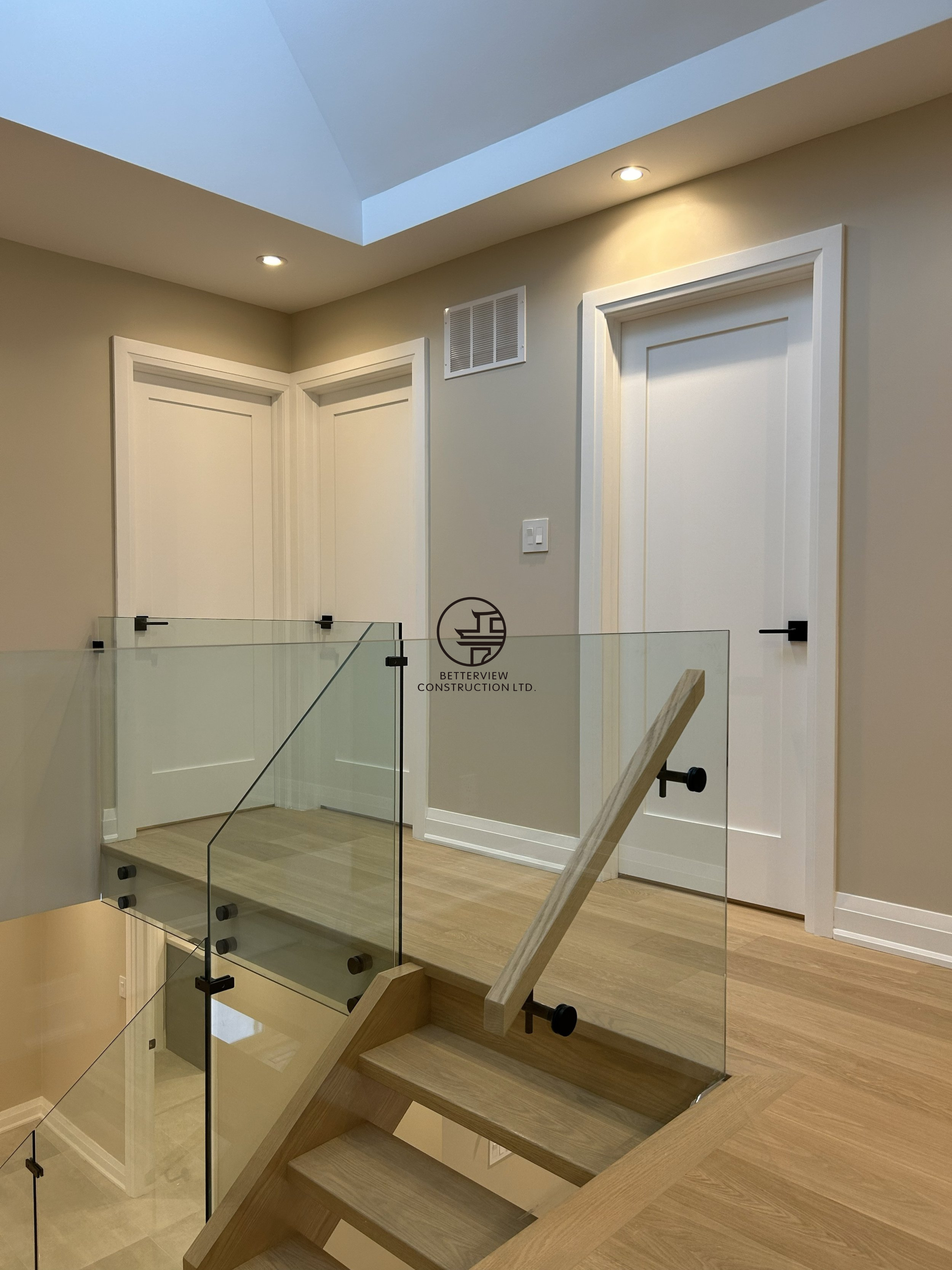 second-floor-stair-landing-glass-railing.png.png