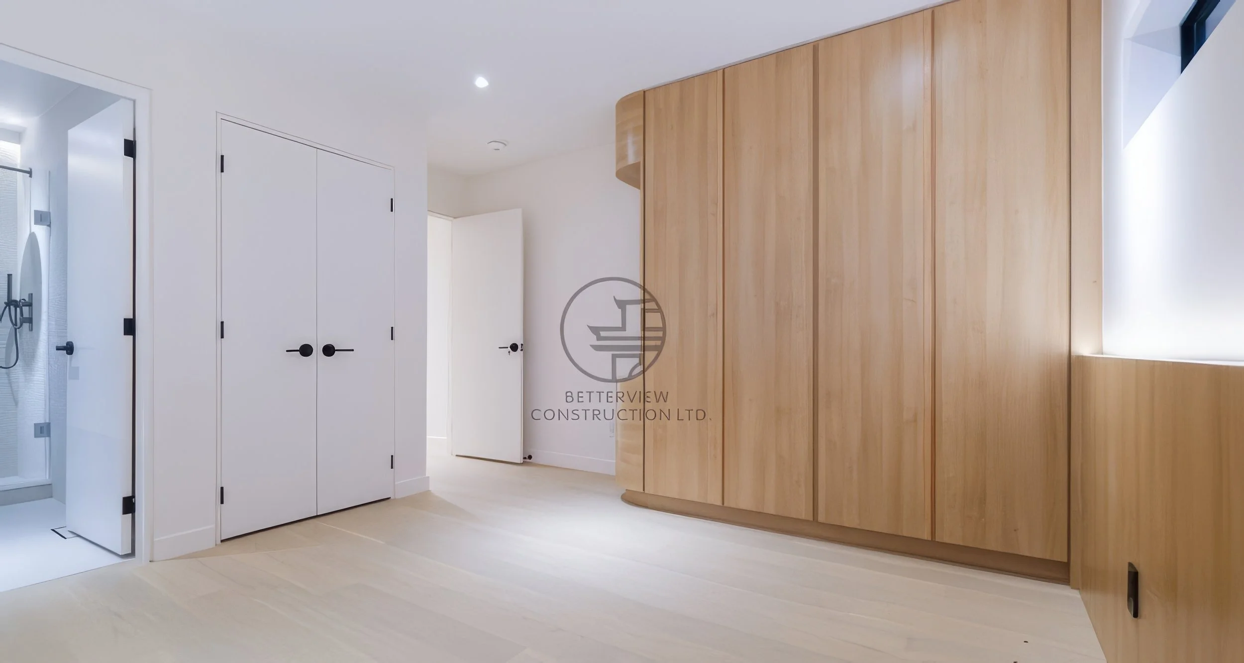 modern bedroom renovation with custom wood wardrobe, built-in storage, and minimalist interior design