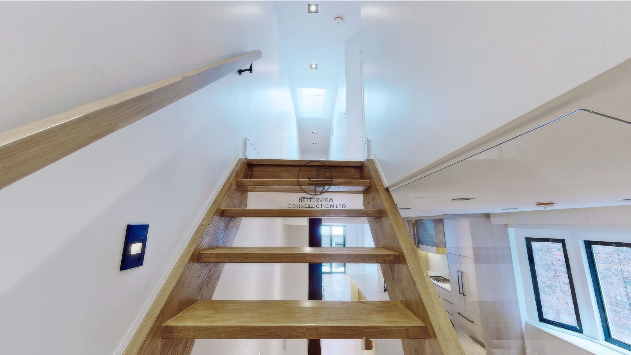 floating-wood-staircase-pov-view-open-concept-home.jpg.png