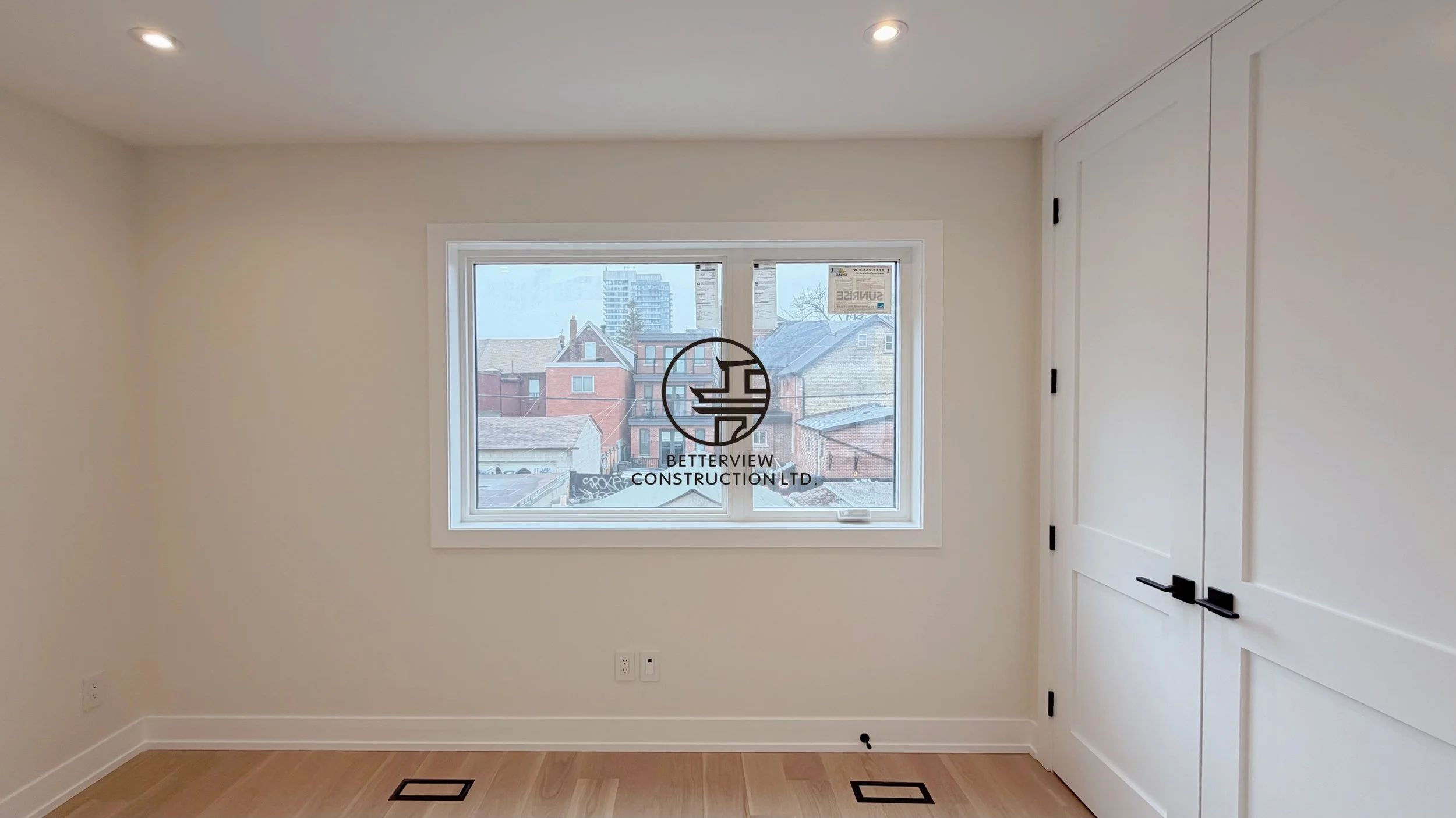 modern-home-renovation-bedroom-natural-light-hardwood-floor.jpg