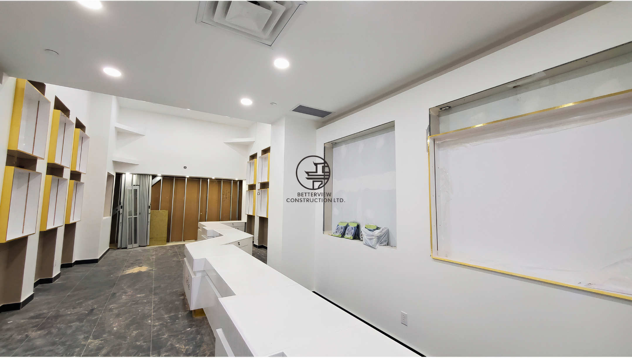 Retail store interior layout with custom counters and display wall design during commercial build-out in Toronto