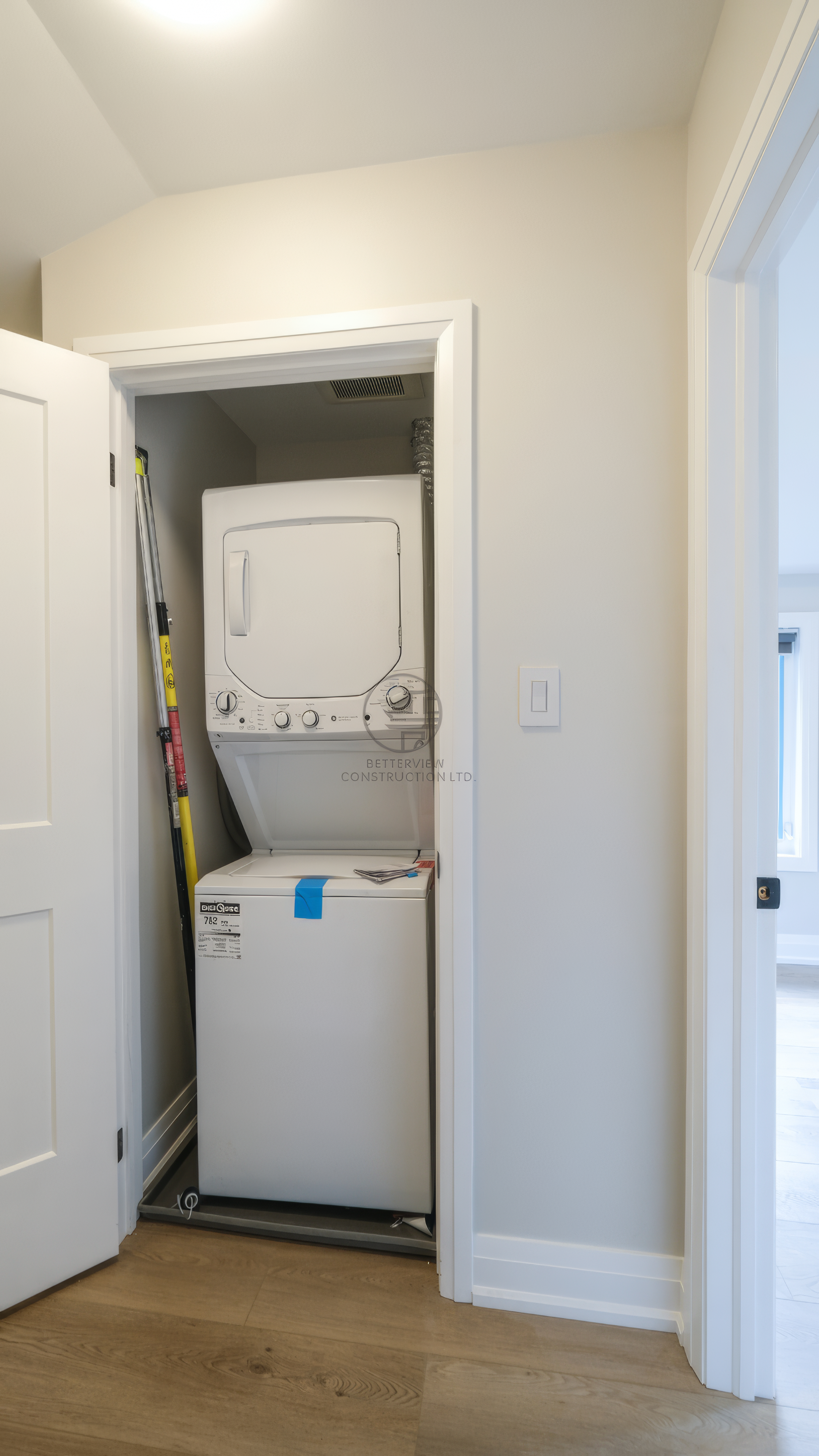 main-floor-laundry-closet-stacked-washer-dryer.jpg.png