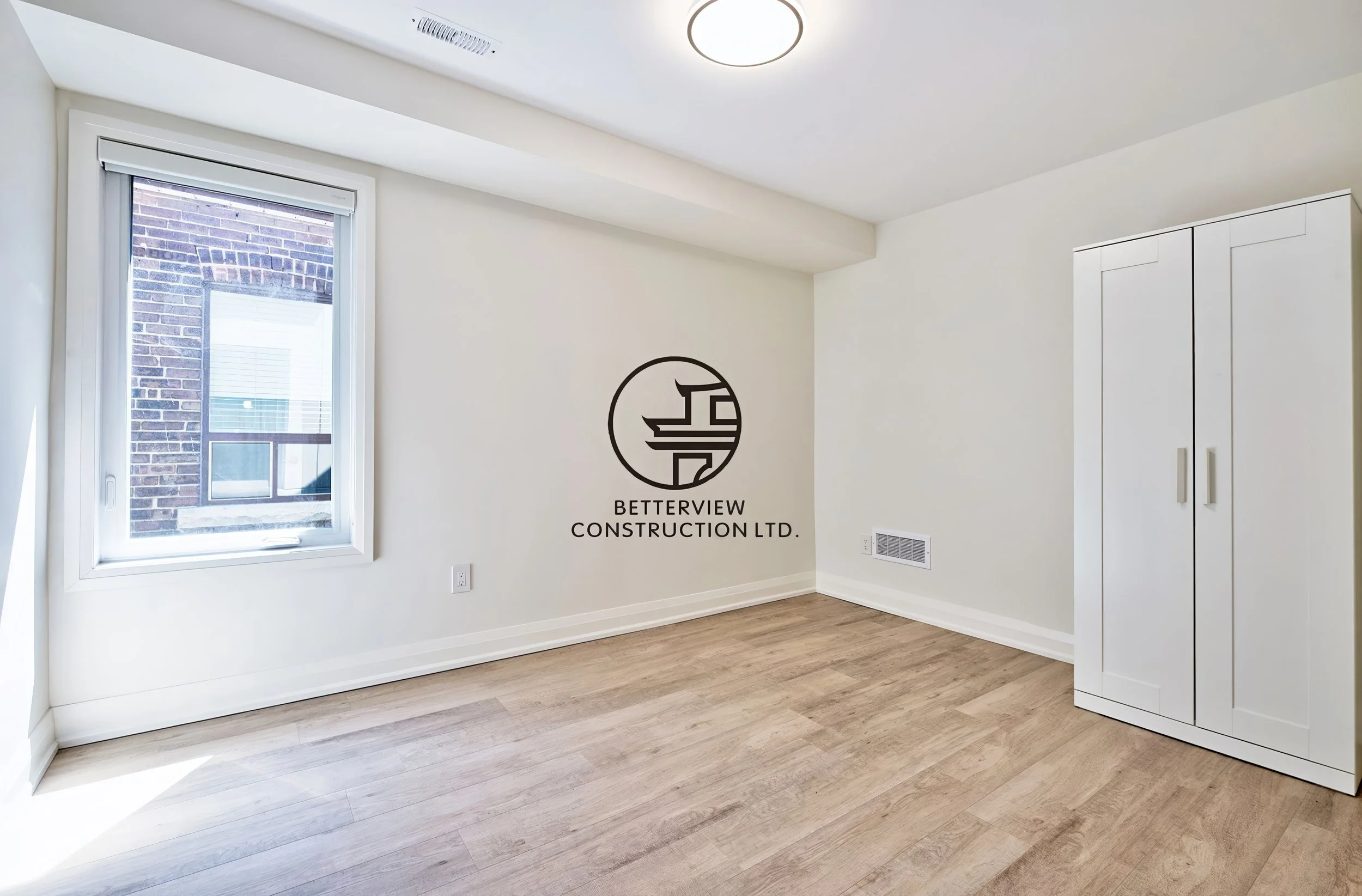basement-bedroom-renovation-modern-flooring-closet-window-gta.jpg.JPG