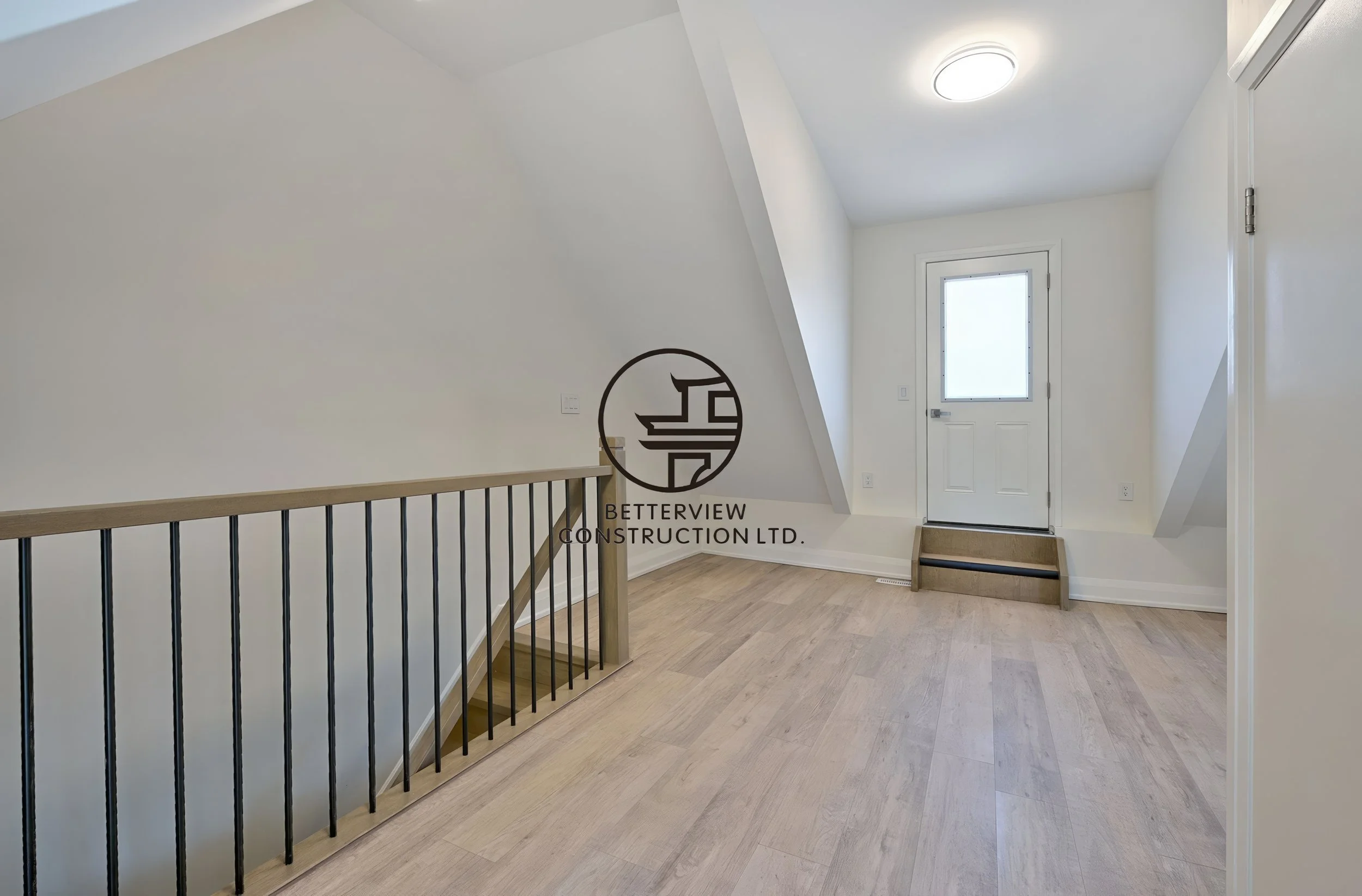 basement-stair-landing-renovation-exit-door-modern-flooring-gta.jpg.JPG