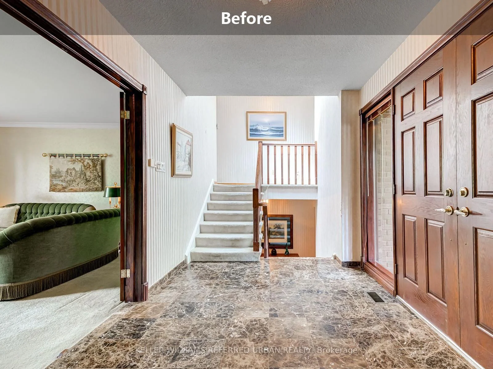 home entryway before renovation with dated flooring and wood doors