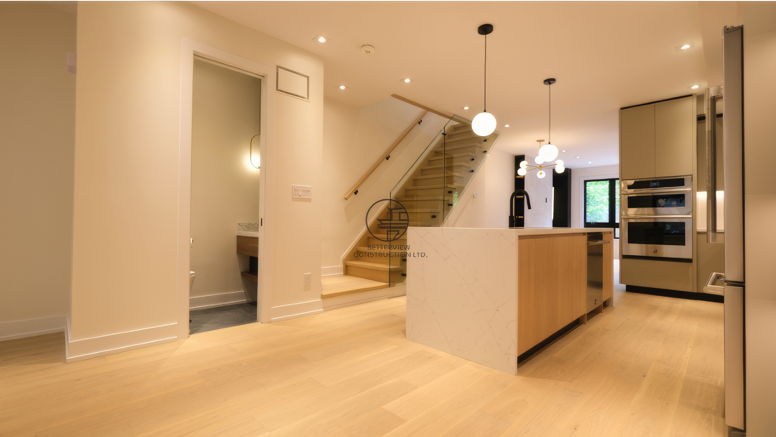 open-concept-main-floor-renovation-kitchen-staircase.jpg.png