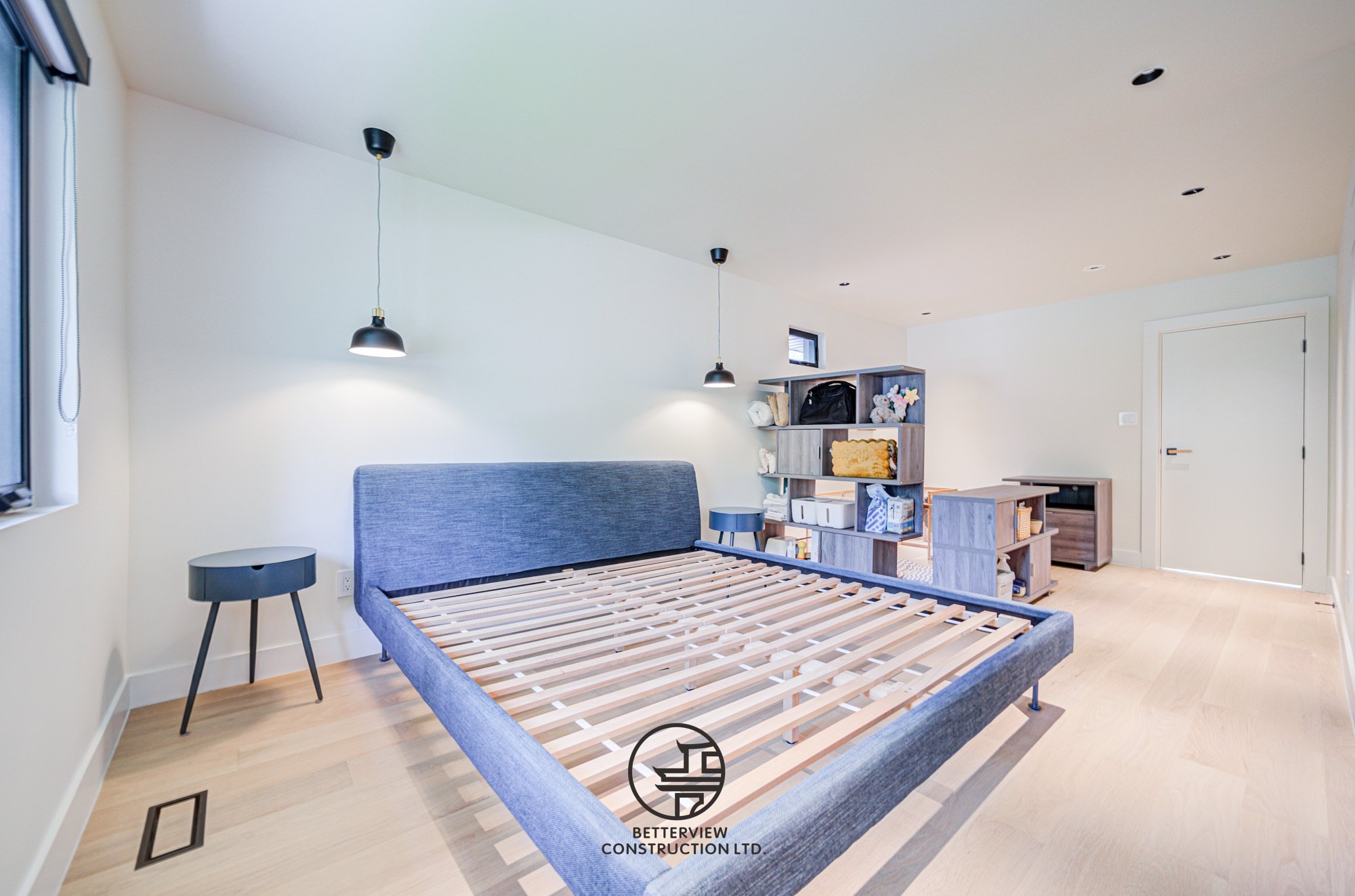 modern loft bedroom space with minimalist design in renovated home