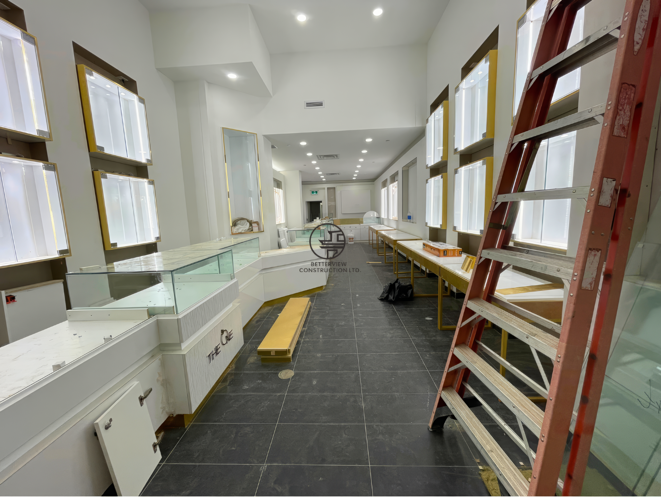 Luxury retail store interior renovation with display counters, integrated lighting, and near-complete commercial build-out in Toronto