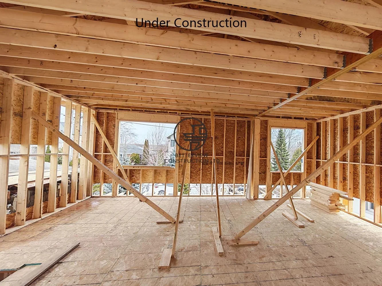 Second floor framing for a custom home renovation and addition, creating larger living spaces with engineered wood framing.